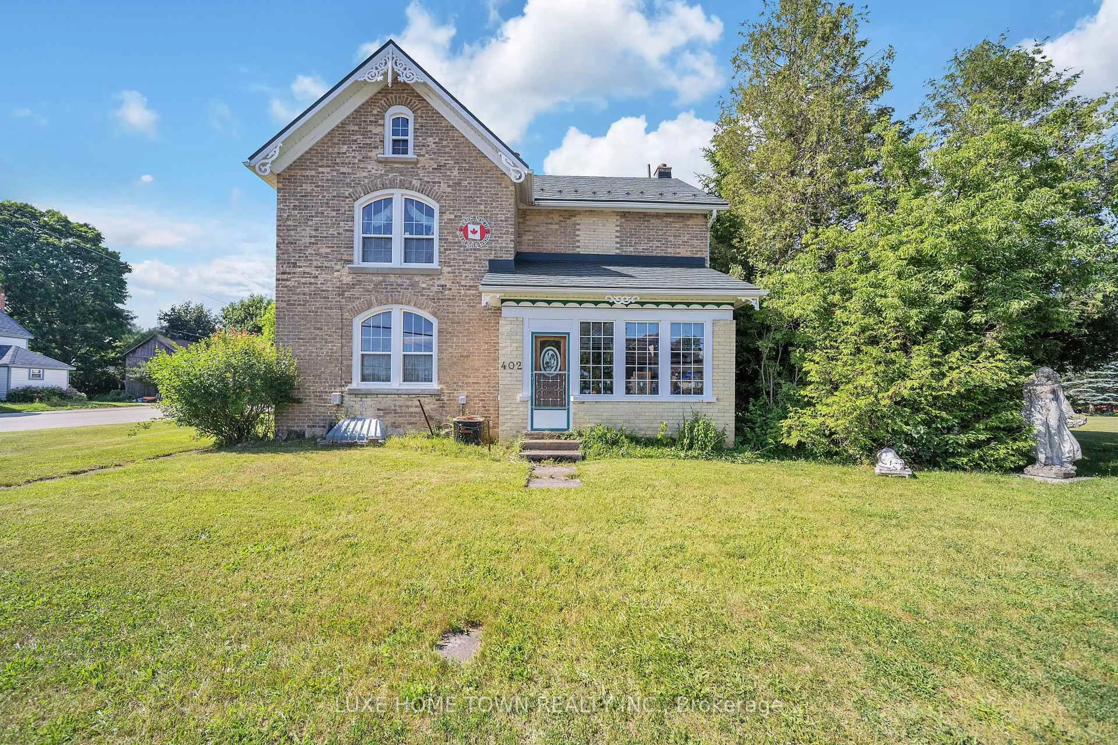 Home with brick exterior material, unknown for 402 LAMBTON St, West Grey Ontario N0G 1R0