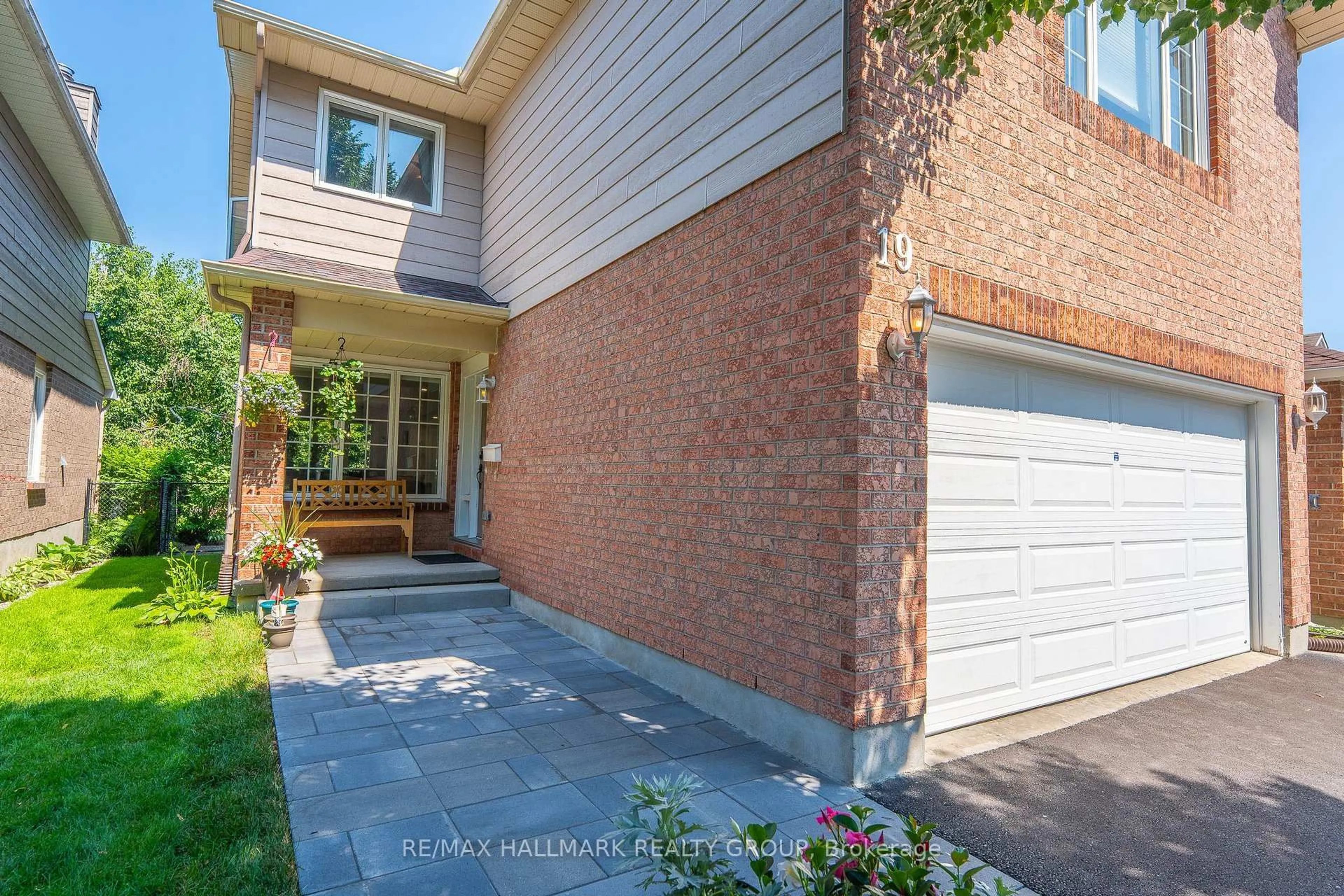 Home with brick exterior material, street for 19 Castlefield Ave, Stittsville Ontario K2S 1E4