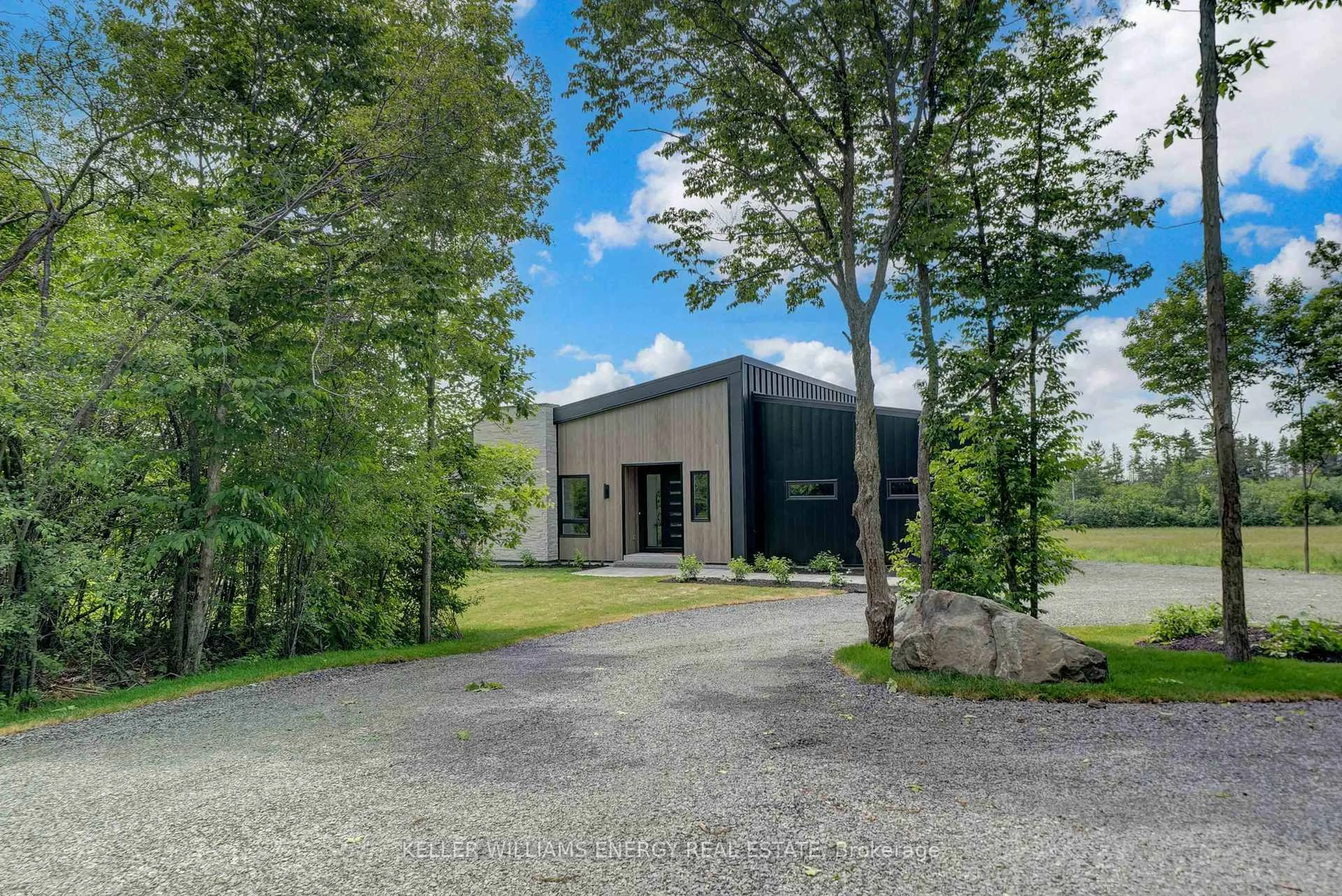 A pic from outside/outdoor area/front of a property/back of a property/a pic from drone, unknown for 13 Partridge Hollow Rd, Prince Edward County Ontario K0K 1T0