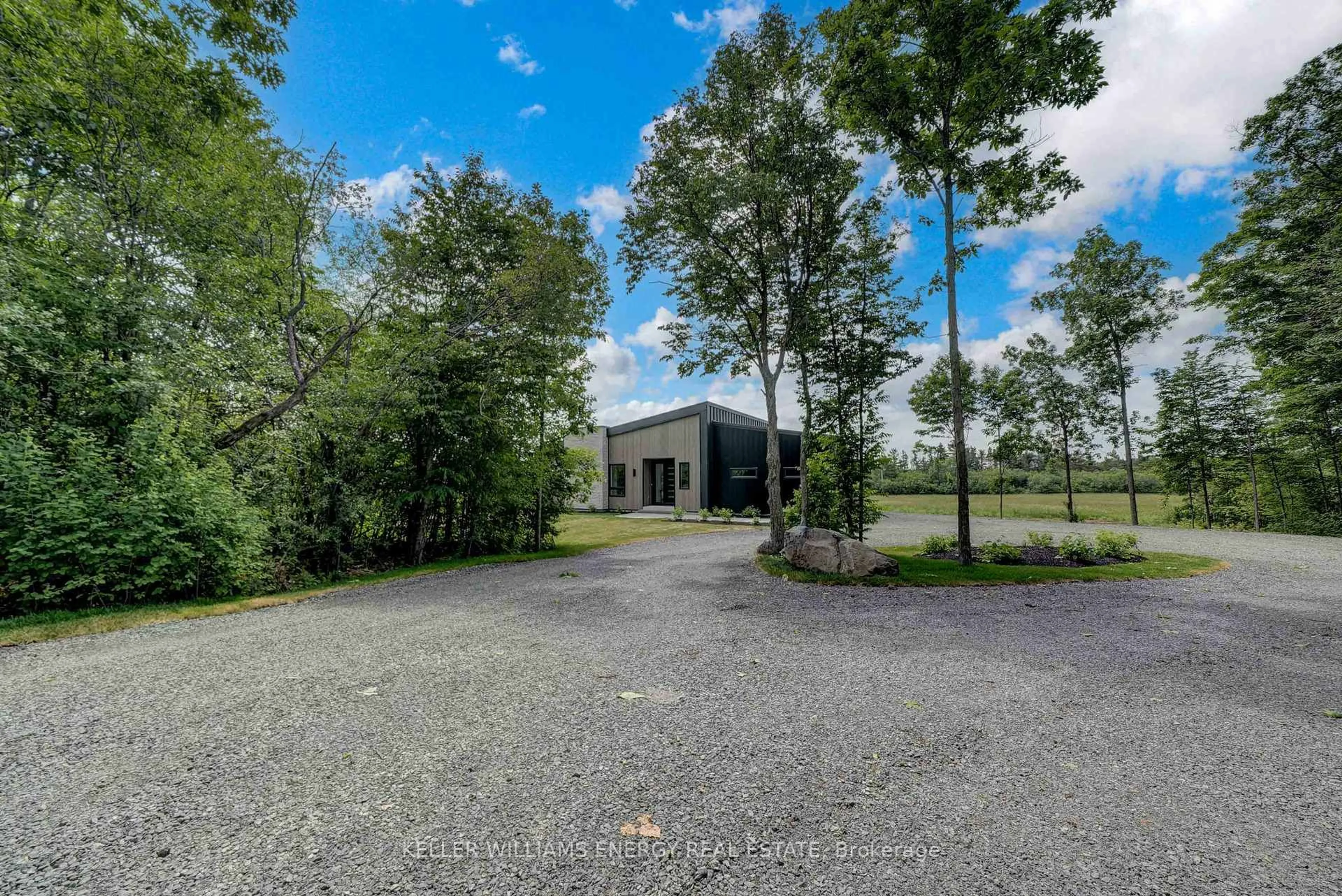 A pic from outside/outdoor area/front of a property/back of a property/a pic from drone, unknown for 13 Partridge Hollow Rd, Prince Edward County Ontario K0K 1T0