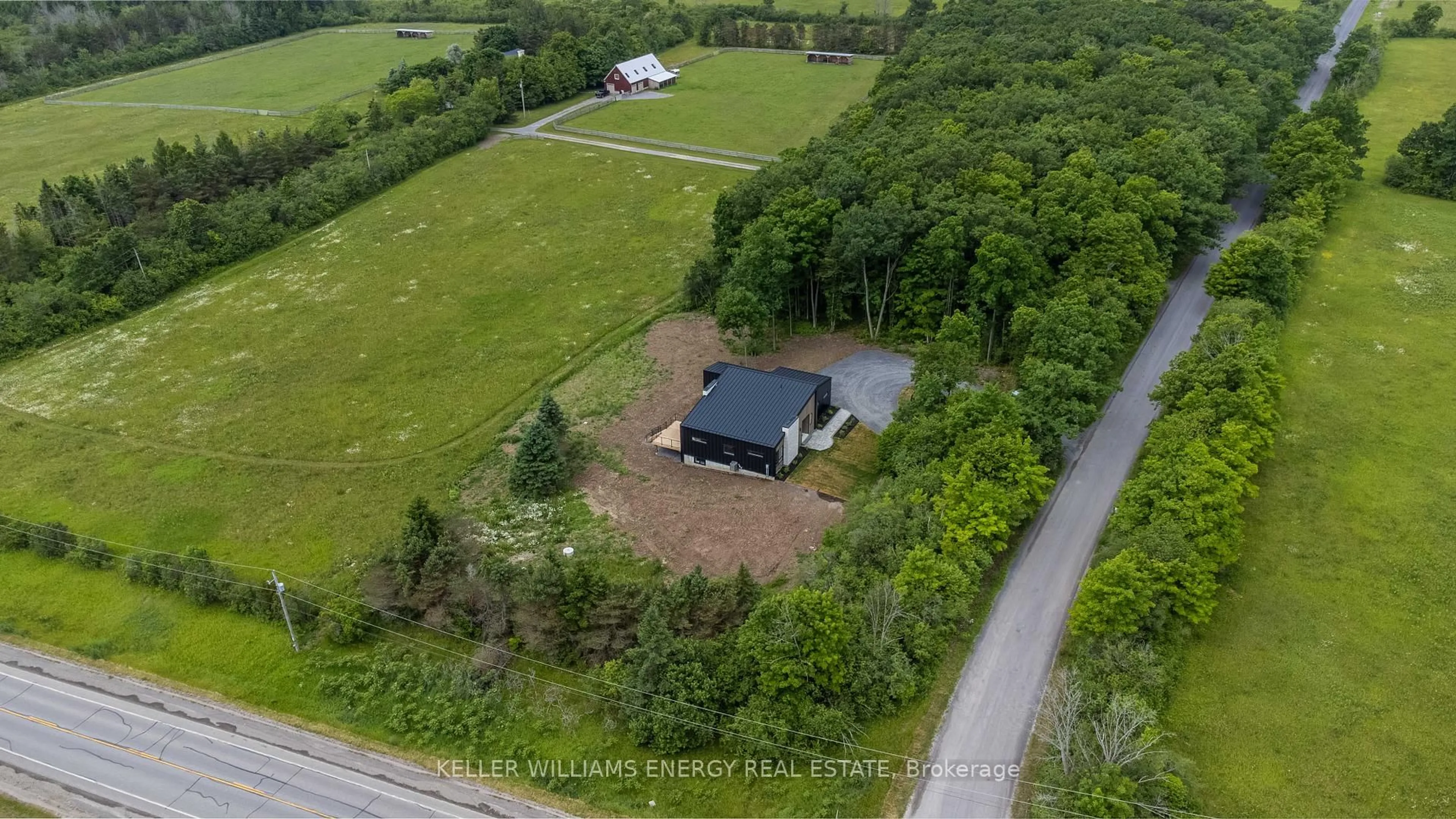 A pic from outside/outdoor area/front of a property/back of a property/a pic from drone, unknown for 13 Partridge Hollow Rd, Prince Edward County Ontario K0K 1T0
