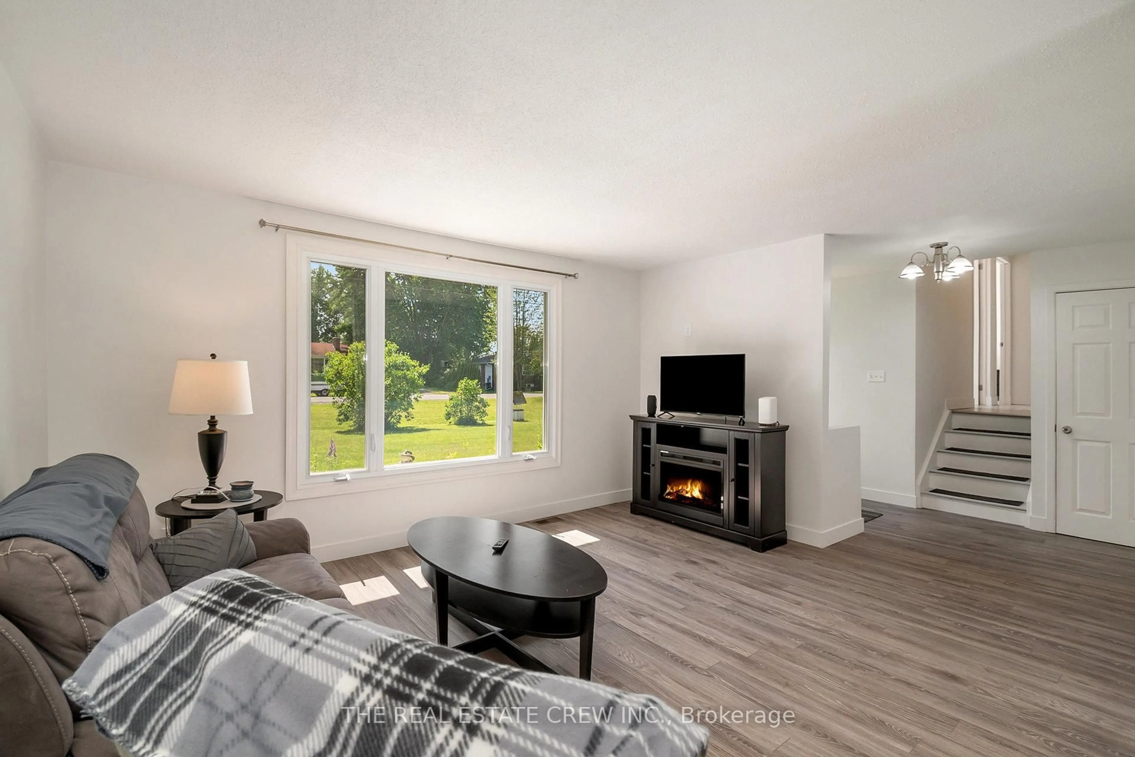 Living room with furniture, wood/laminate floor for 144 Forest Lane, The Nation Ontario K0A 1W0