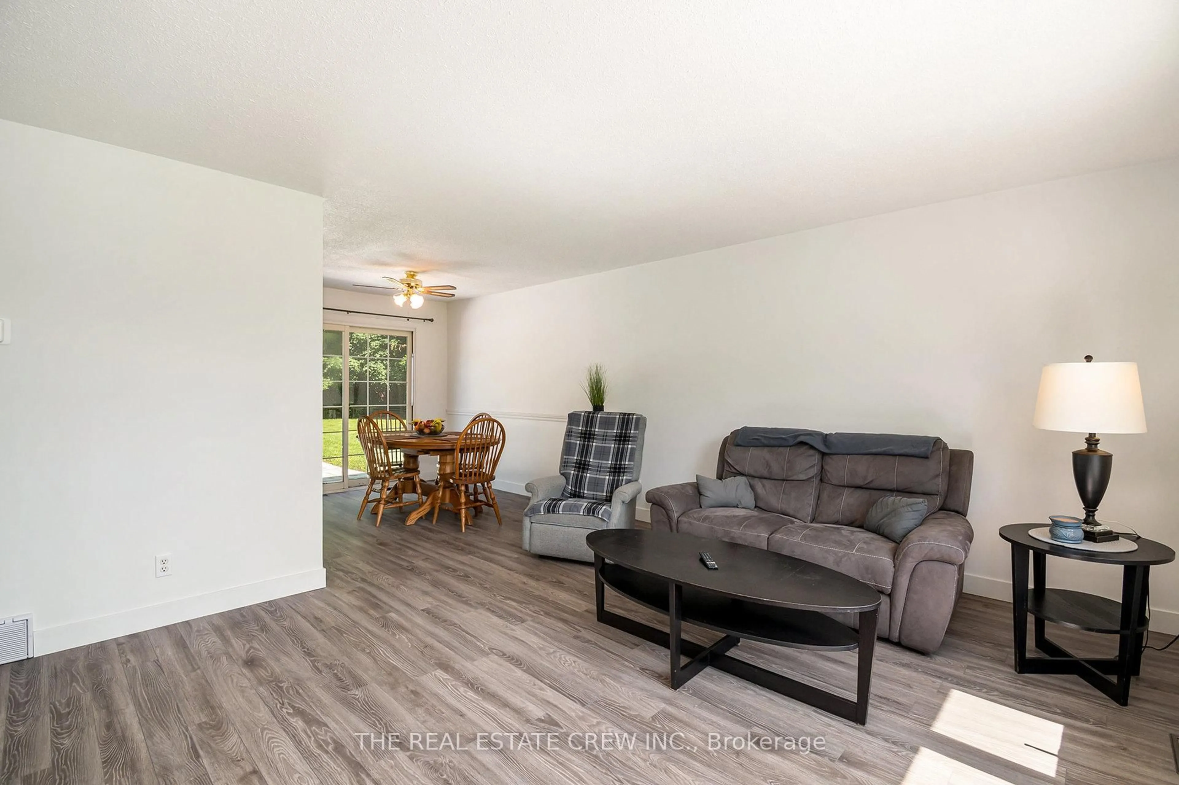 Living room with furniture, wood/laminate floor for 144 Forest Lane, The Nation Ontario K0A 1W0