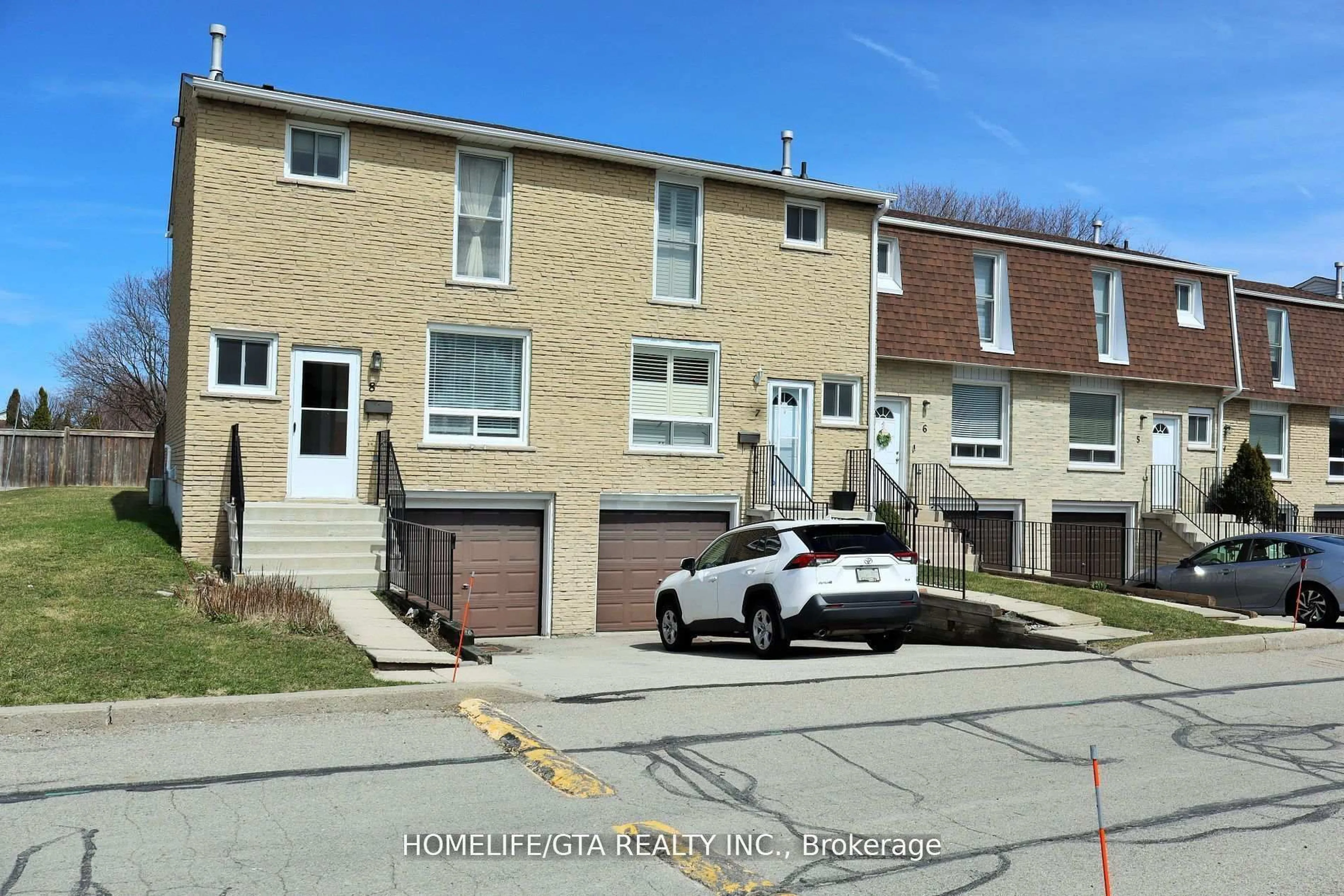 A pic from outside/outdoor area/front of a property/back of a property/a pic from drone, street for 1338 Upper Gage Ave #8, Hamilton Ontario L8W 1N2