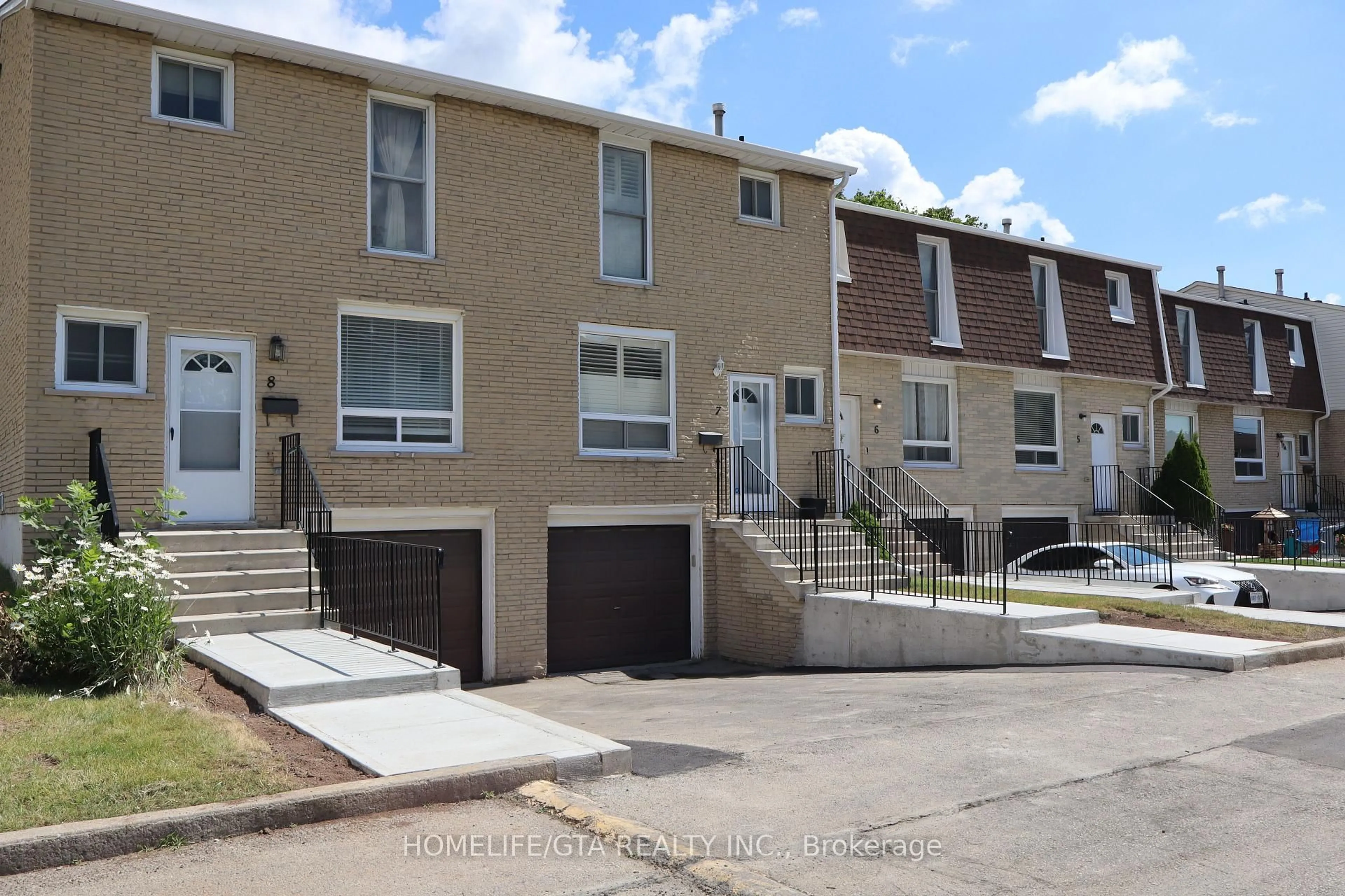 Home with vinyl exterior material, street for 1338 Upper Gage Ave #8, Hamilton Ontario L8W 1N2