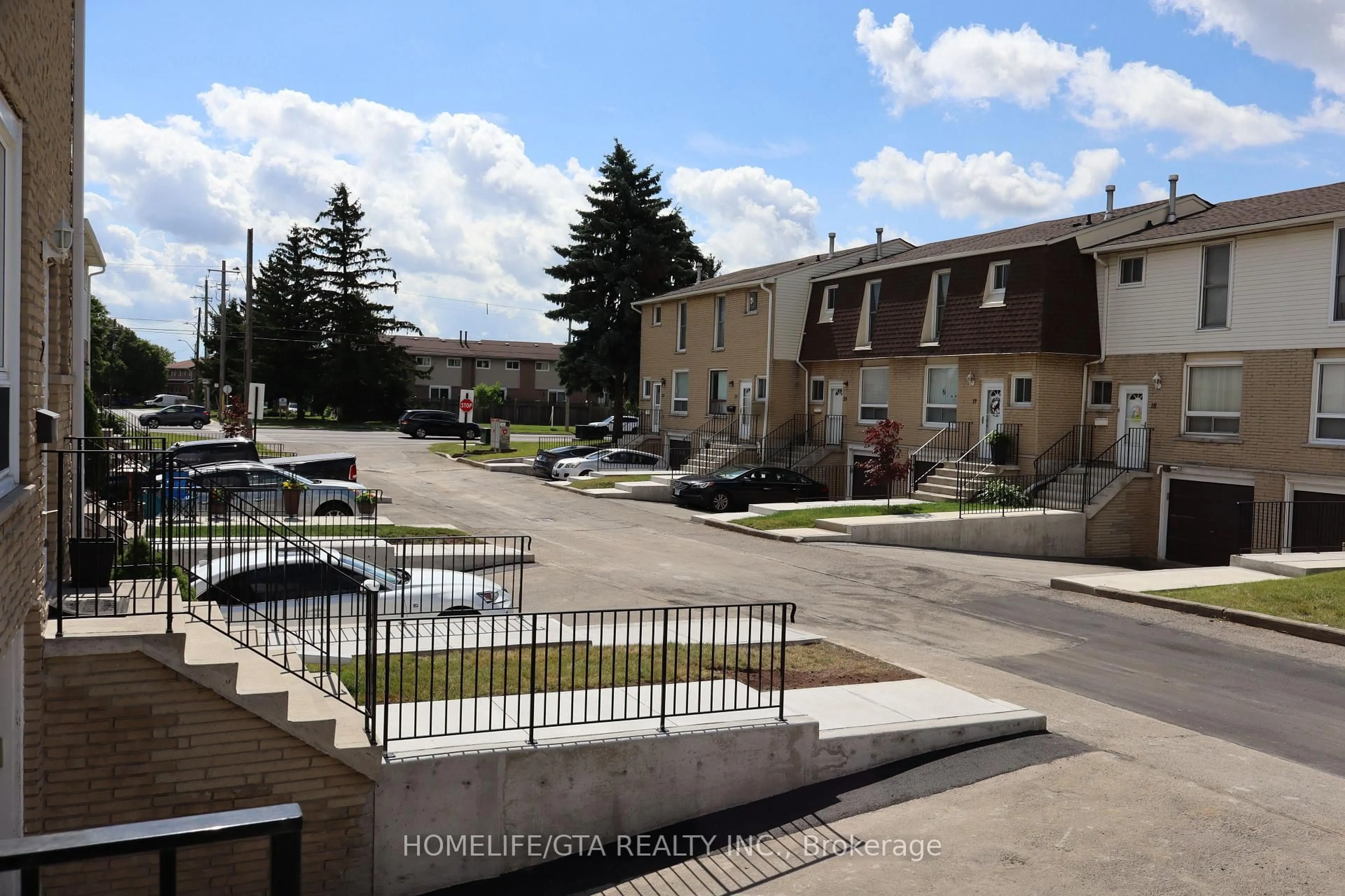 A pic from outside/outdoor area/front of a property/back of a property/a pic from drone, street for 1338 Upper Gage Ave #8, Hamilton Ontario L8W 1N2