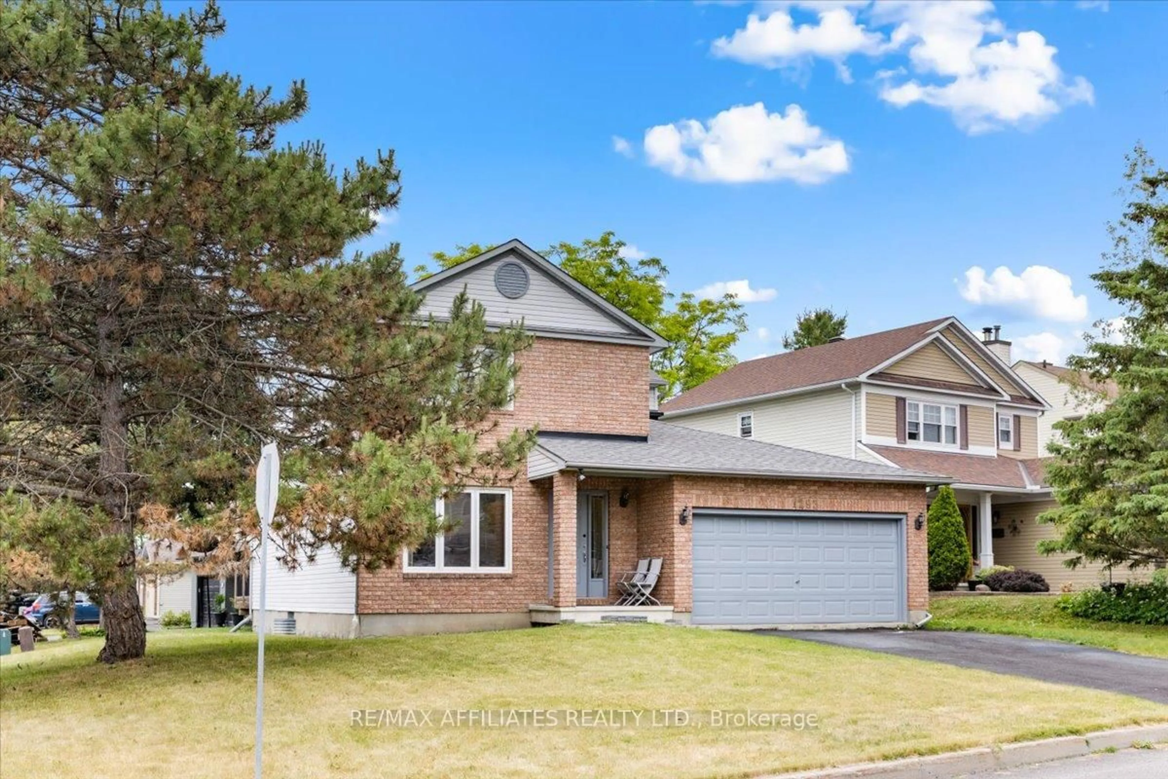 Home with brick exterior material, street for 1293 Parc Du Village Rd, Ottawa Ontario K1C 7B2