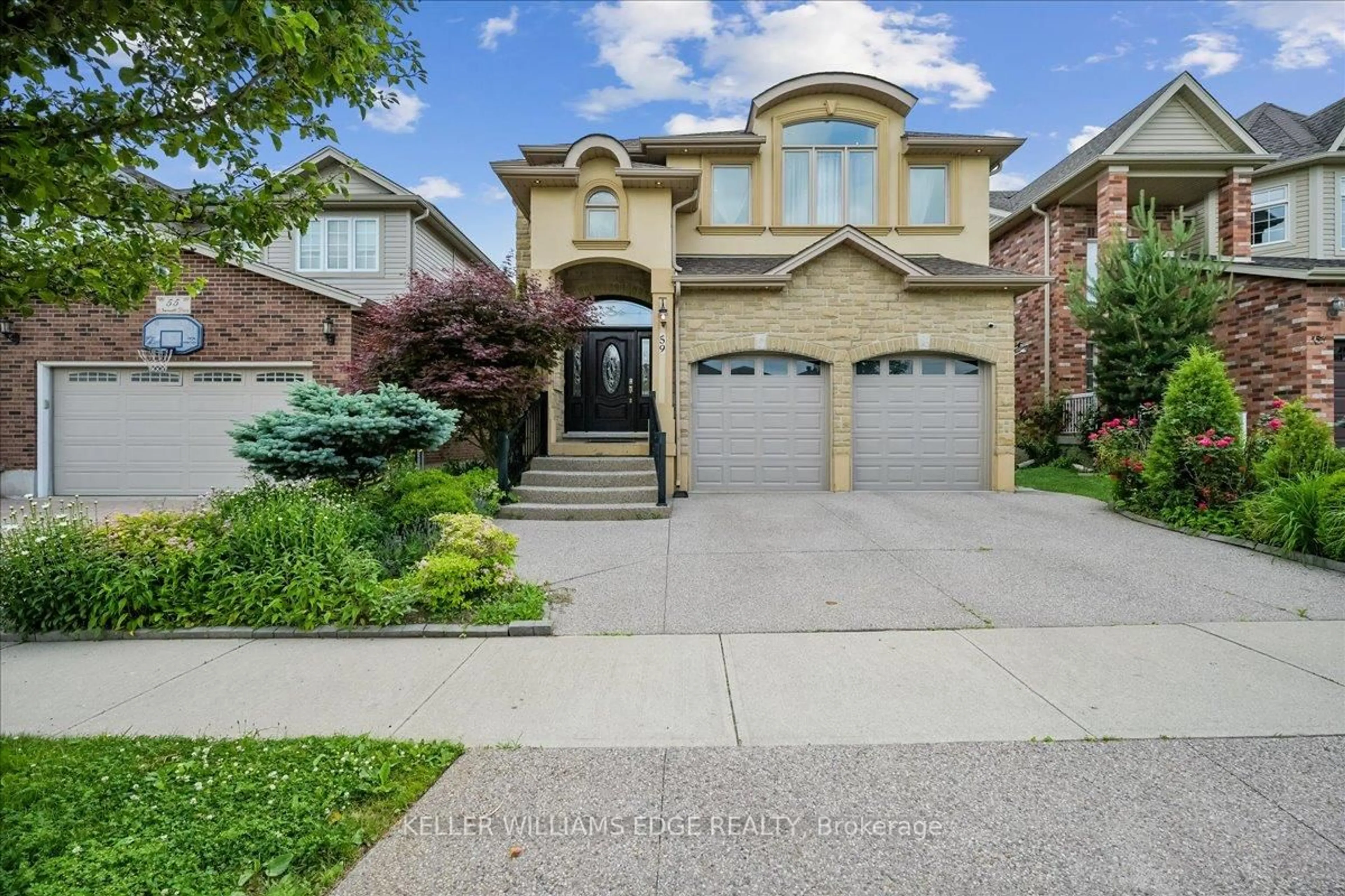 Home with brick exterior material, street for 59 Newcastle Dr, Kitchener Ontario N2R 1X2