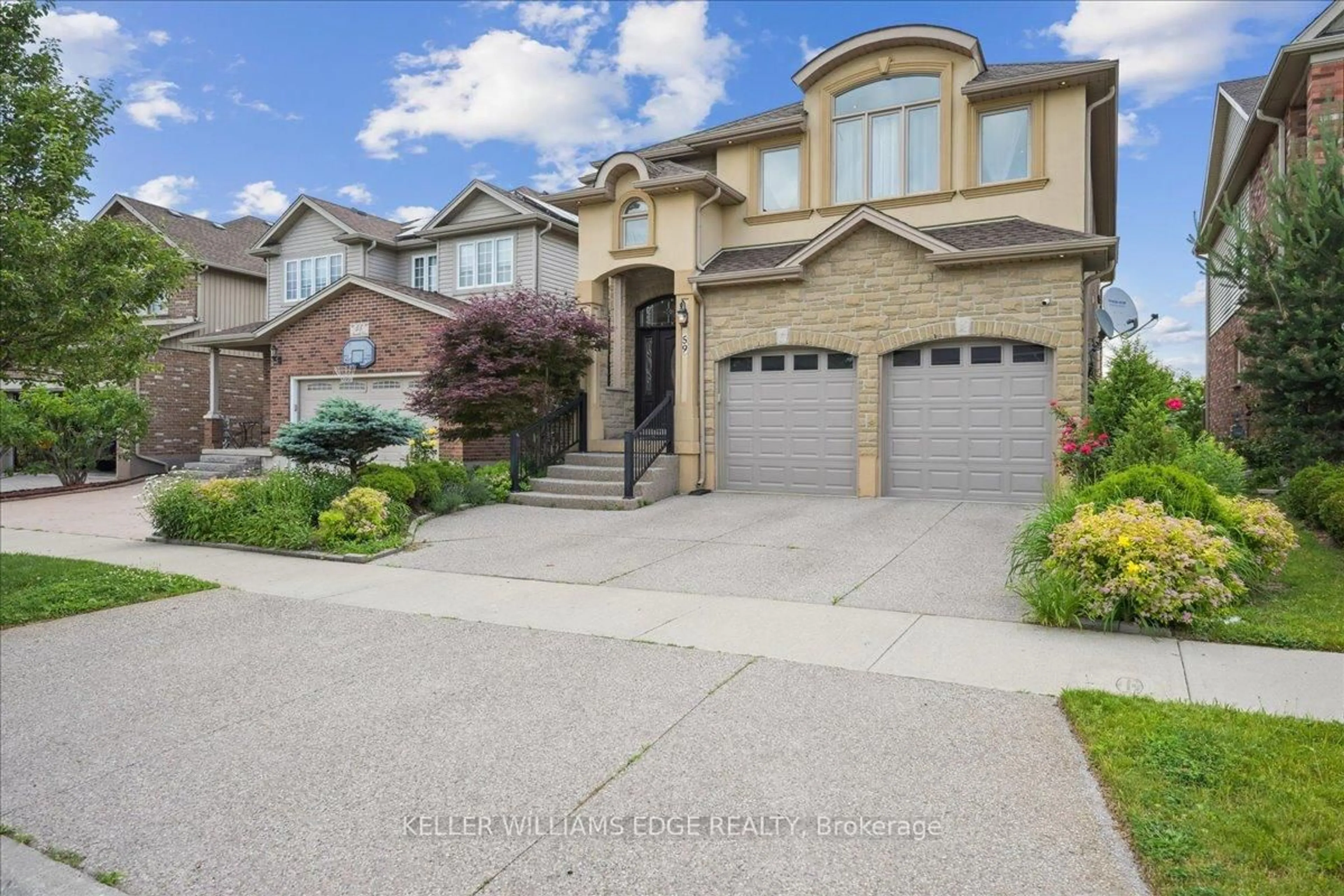 Home with brick exterior material, street for 59 Newcastle Dr, Kitchener Ontario N2R 1X2
