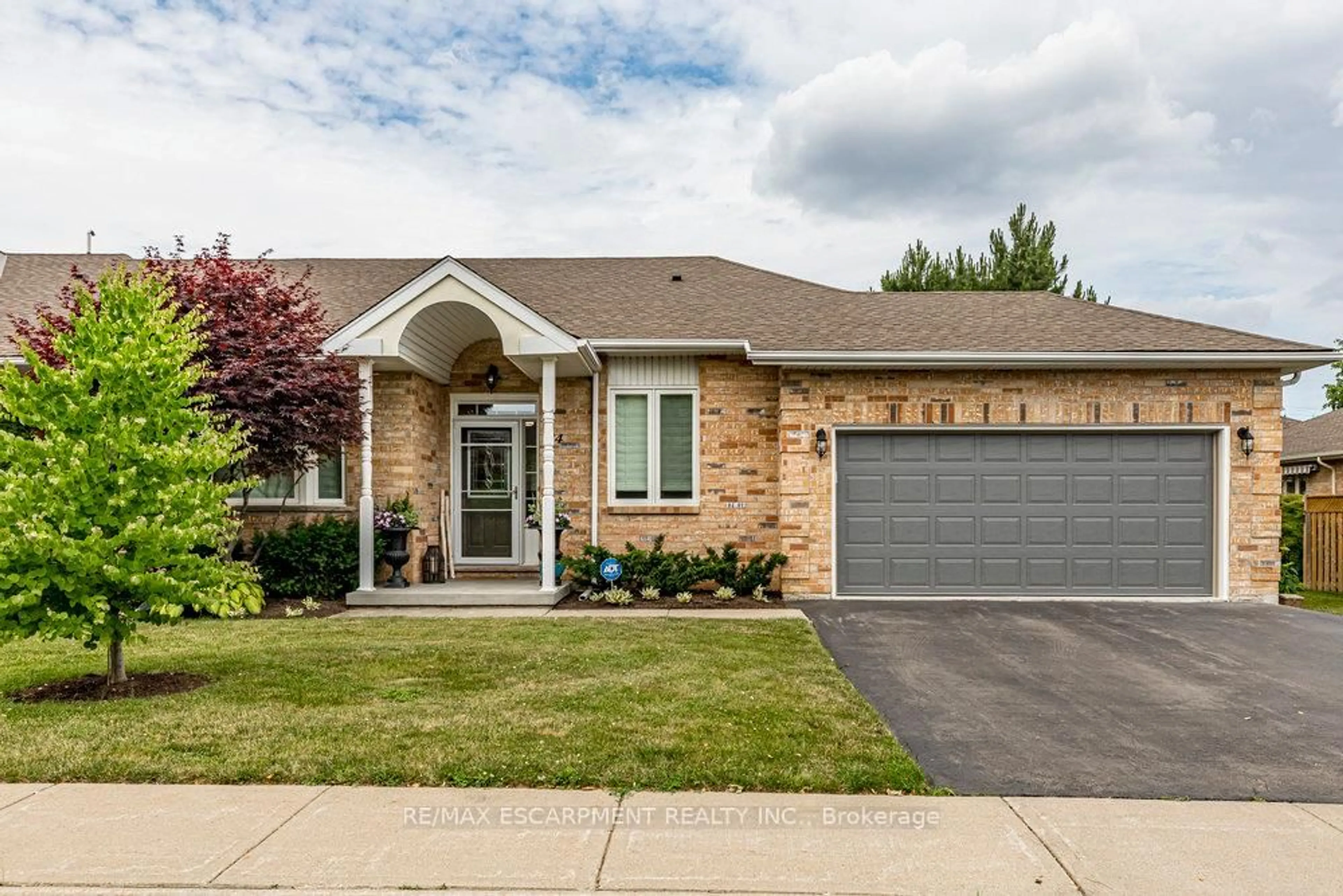 Home with brick exterior material, street for 84 Sandollar Dr, Hamilton Ontario L0R 1W0