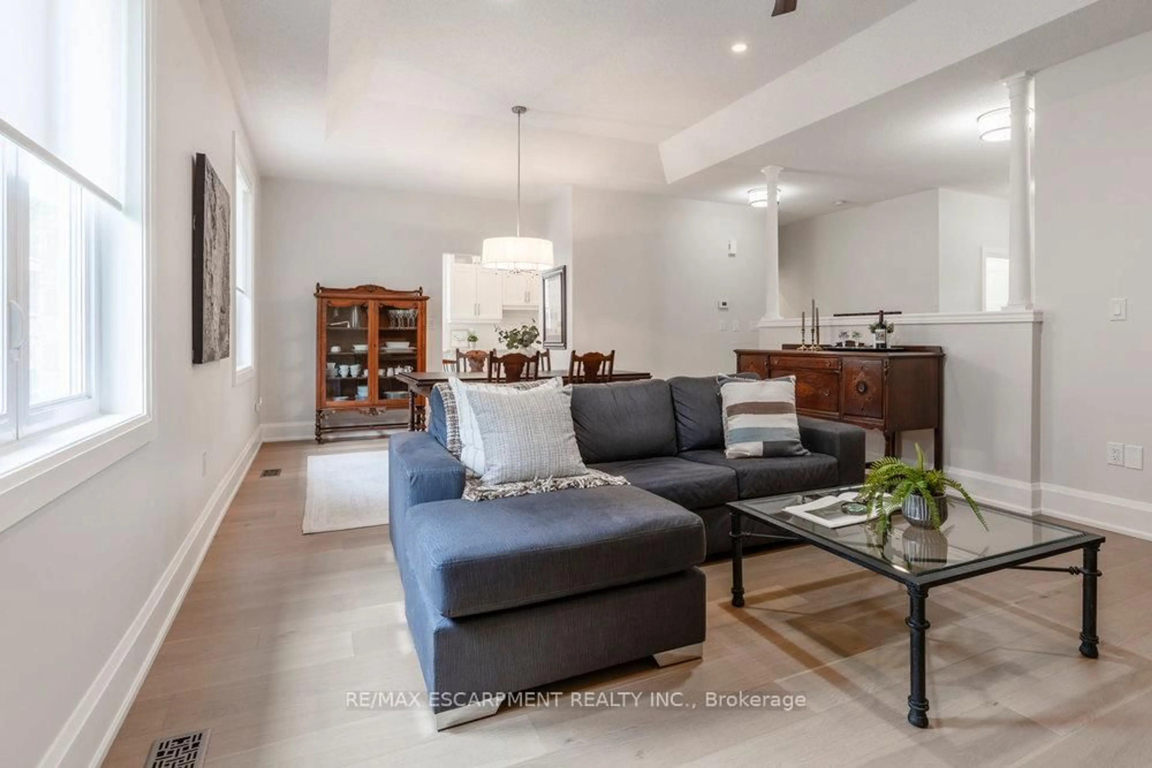 Living room with furniture, unknown for 84 Sandollar Dr, Hamilton Ontario L0R 1W0