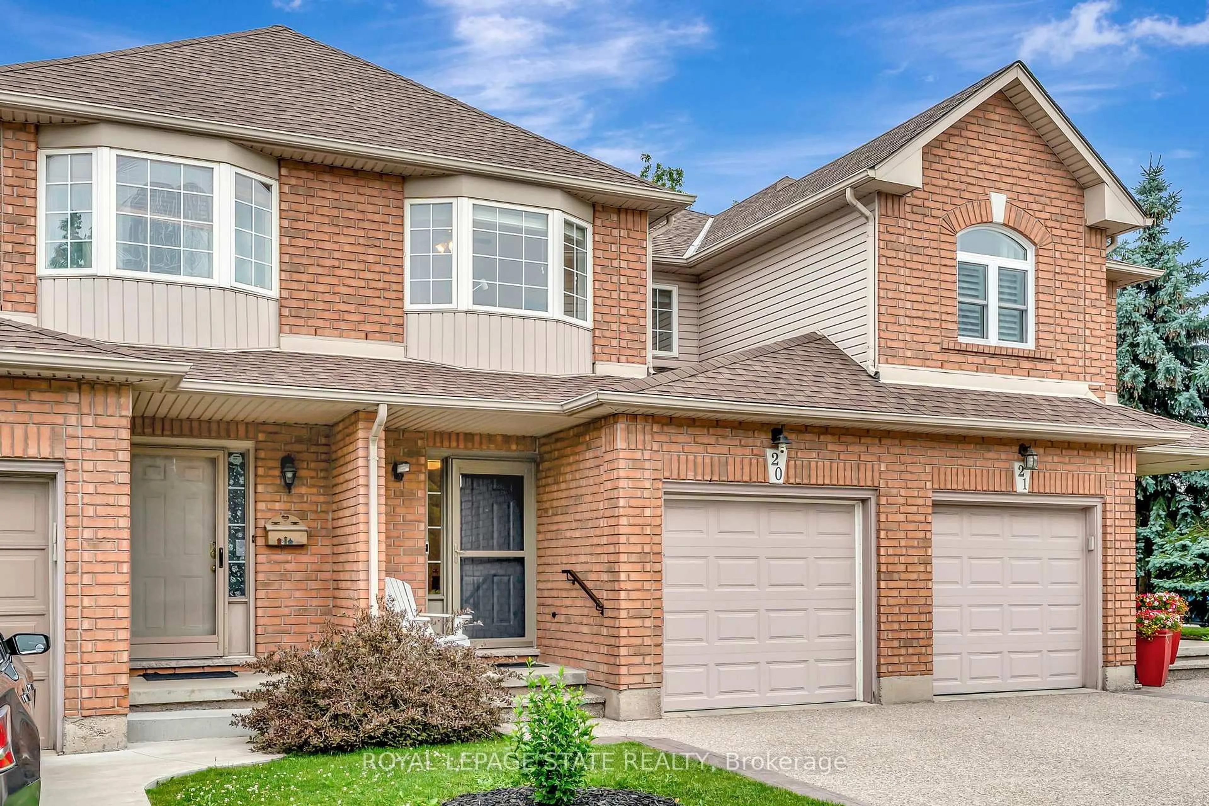 Home with brick exterior material, street for 348 Highland Rd #20, Hamilton Ontario L8J 3W5