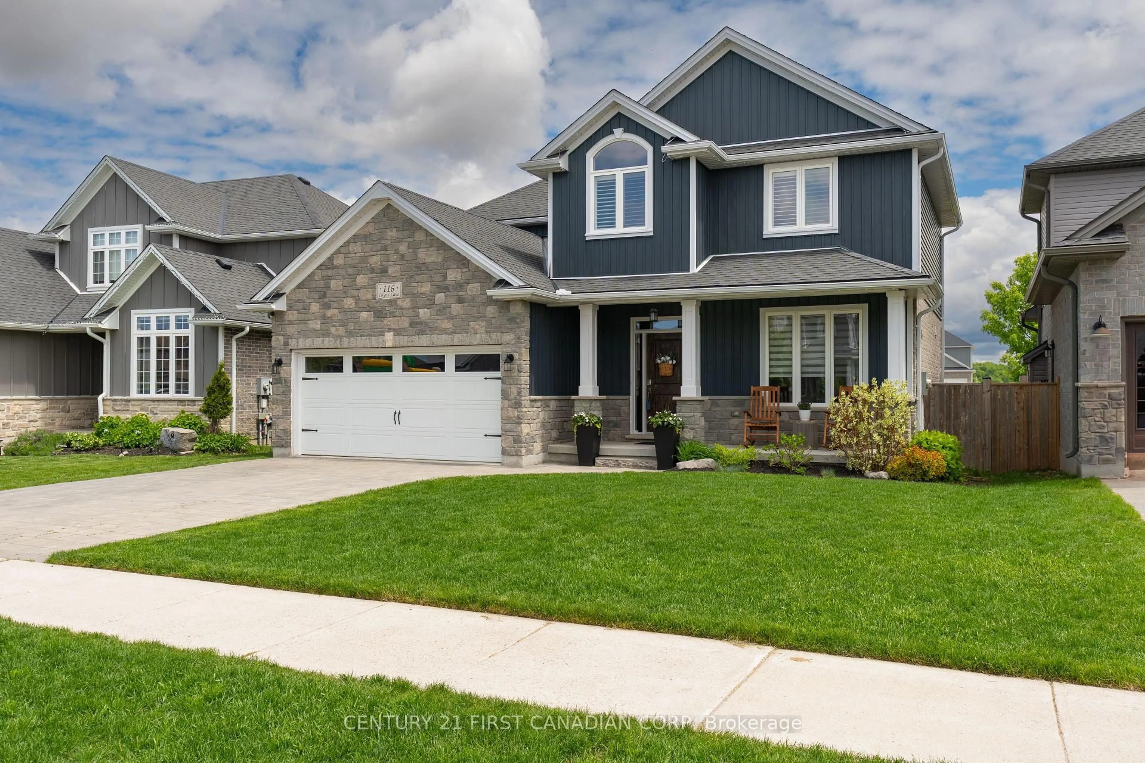 Home with vinyl exterior material, street for 116 Coyne Lane, Lucan Biddulph Ontario N0M 2J0