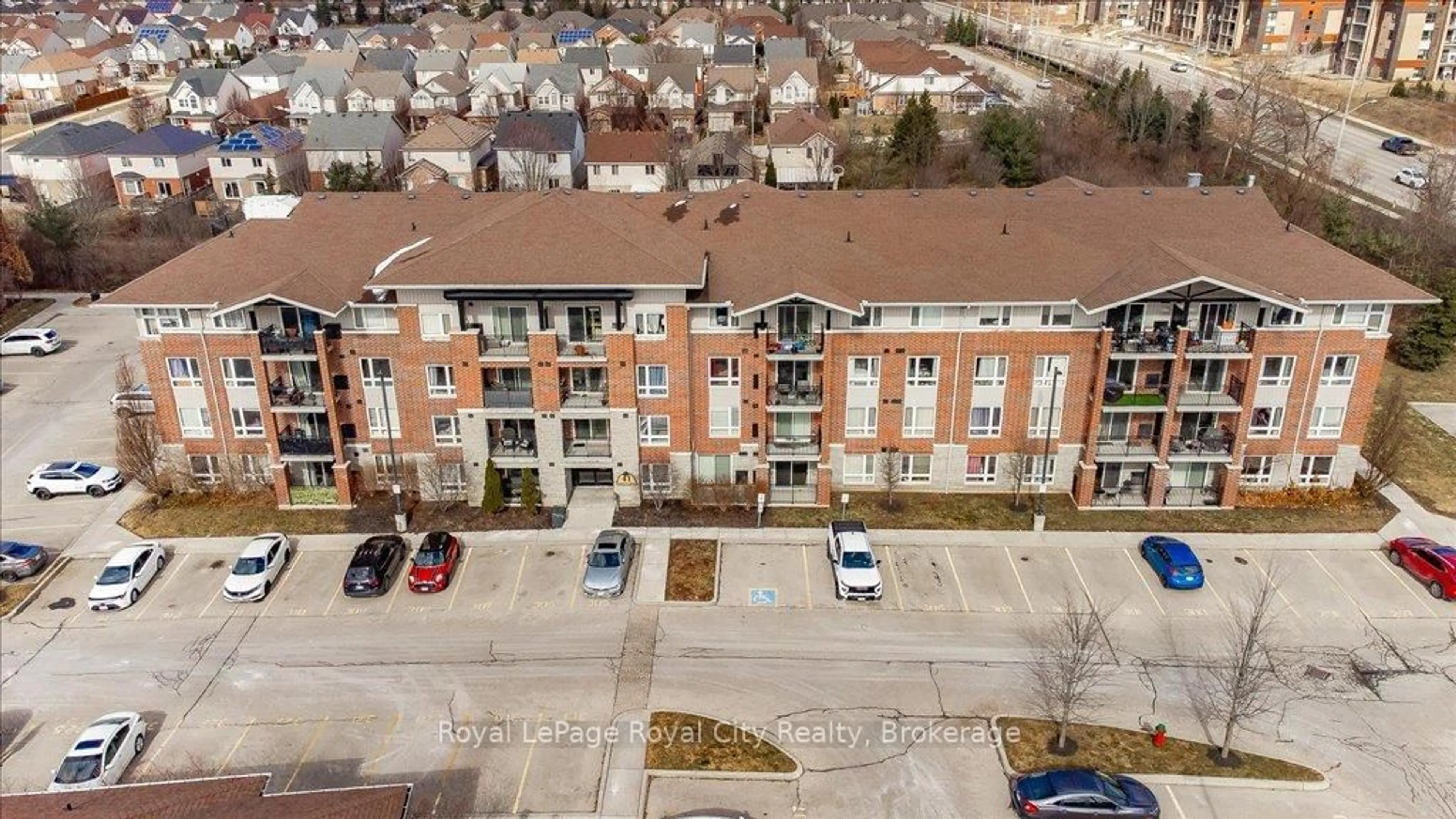 A pic from outside/outdoor area/front of a property/back of a property/a pic from drone, city buildings view from balcony for 41 Goodwin Dr #403, Guelph Ontario N1L 0E7