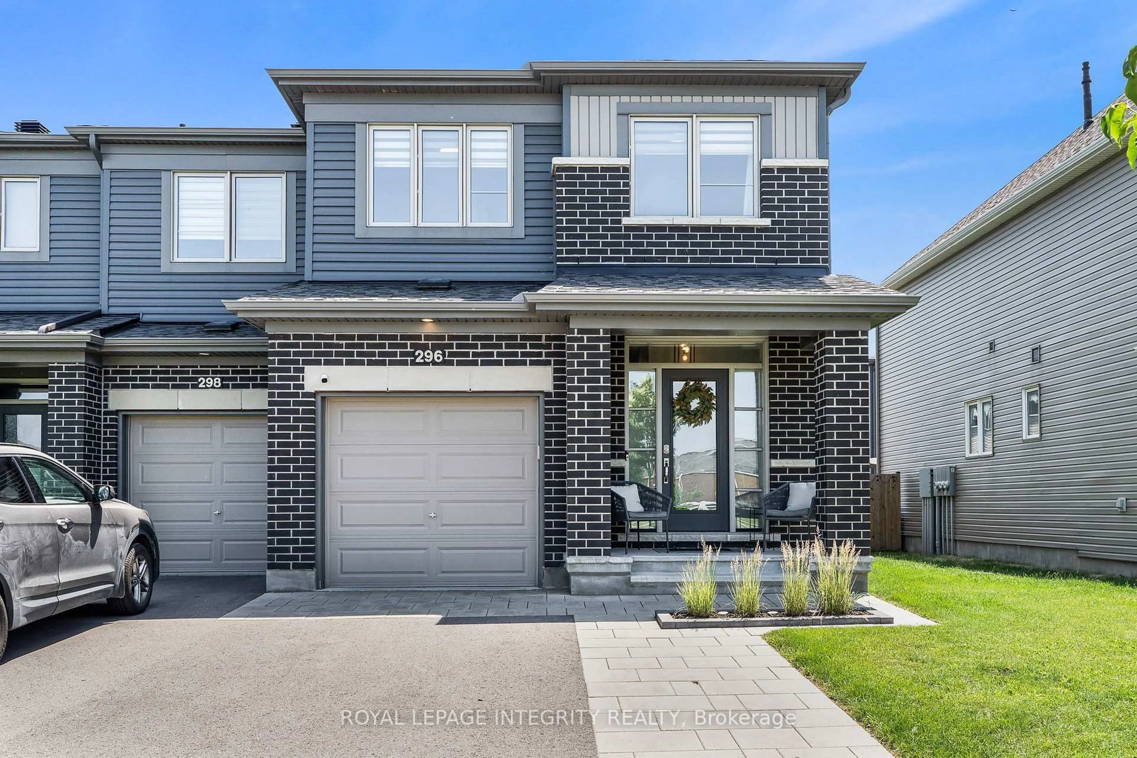 Home with brick exterior material, street for 296 Mountain Sorrel Way, Ottawa Ontario K4A 1H6