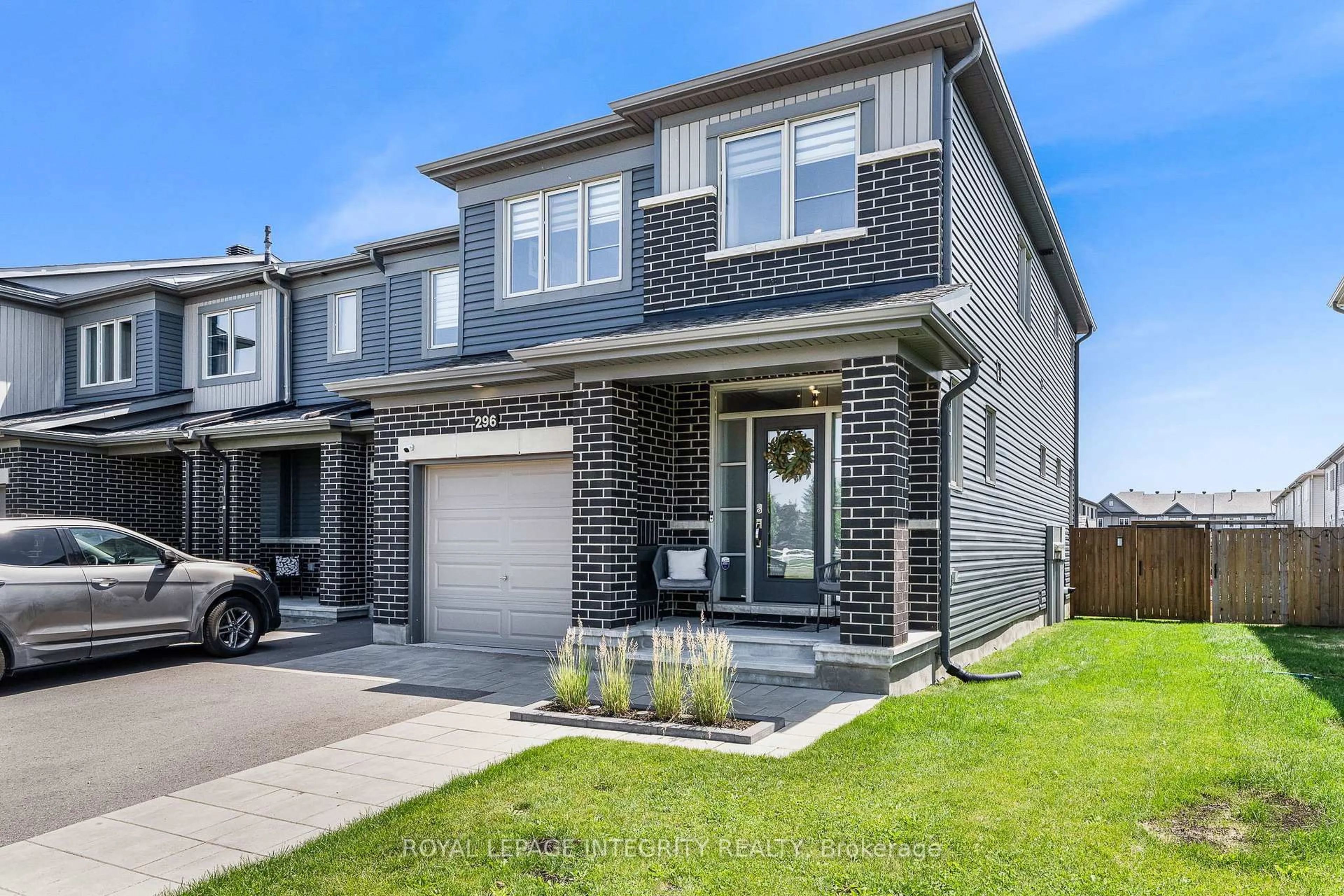Home with brick exterior material, street for 296 Mountain Sorrel Way, Ottawa Ontario K4A 1H6