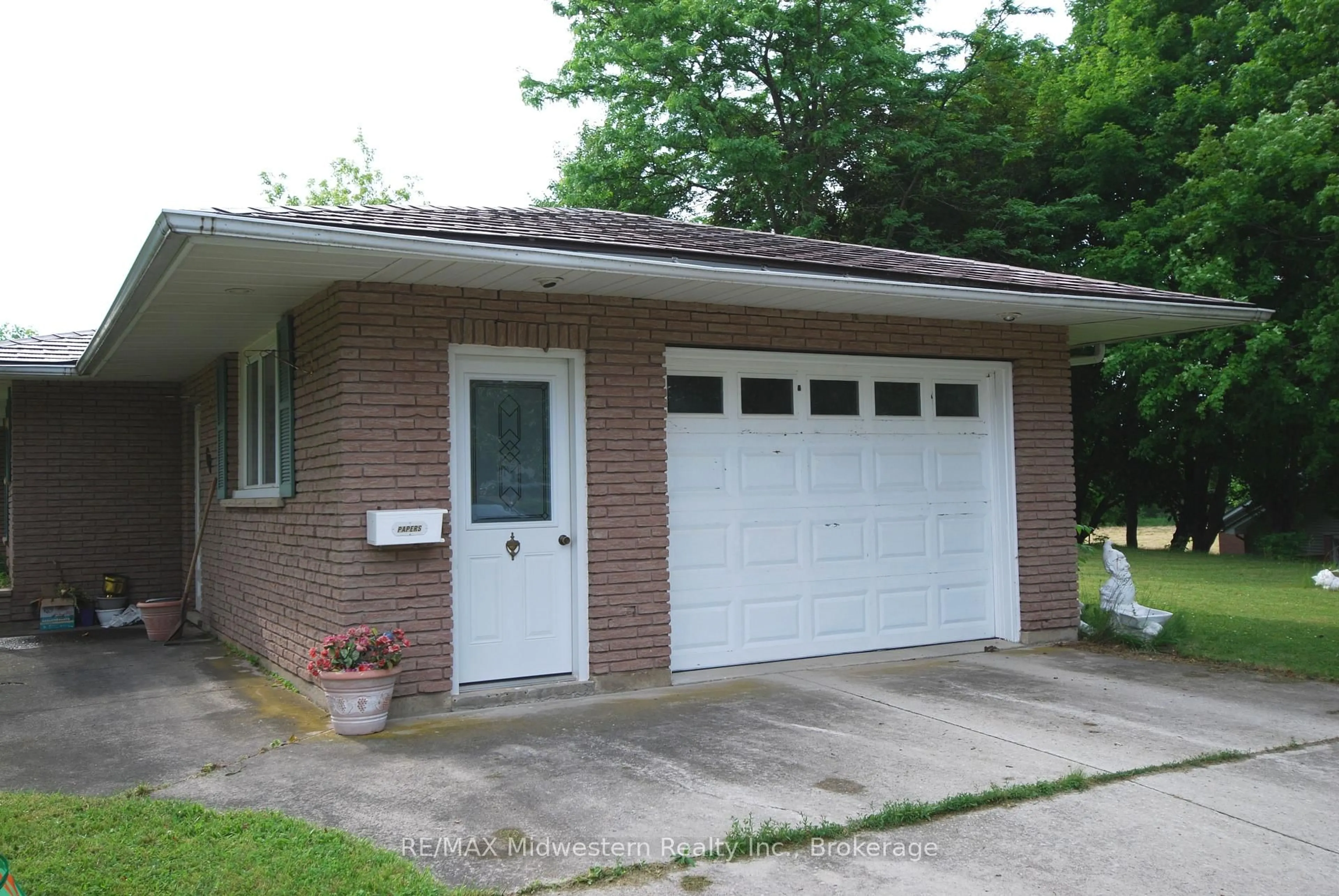 Home with brick exterior material, street for 68 Elora St, Minto Ontario N0G 1M0