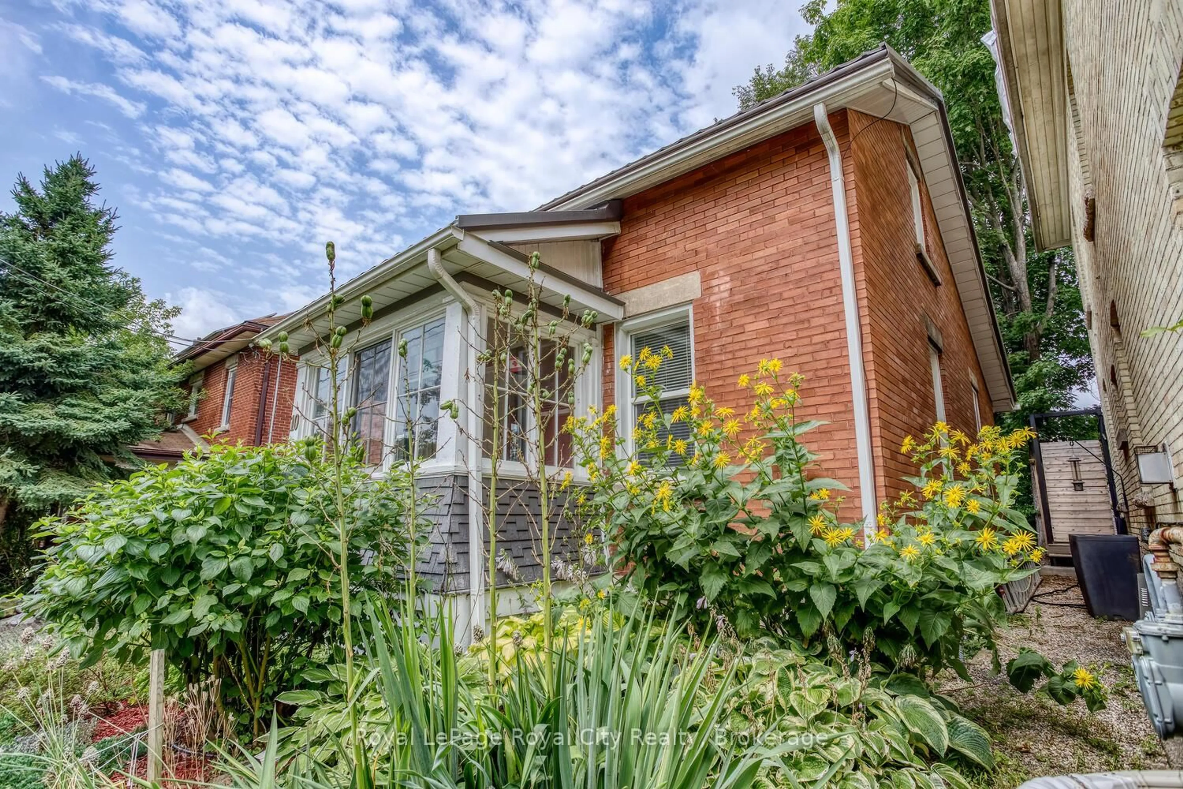 Home with brick exterior material, street for 10 Pearl St, Guelph Ontario N1E 2E3