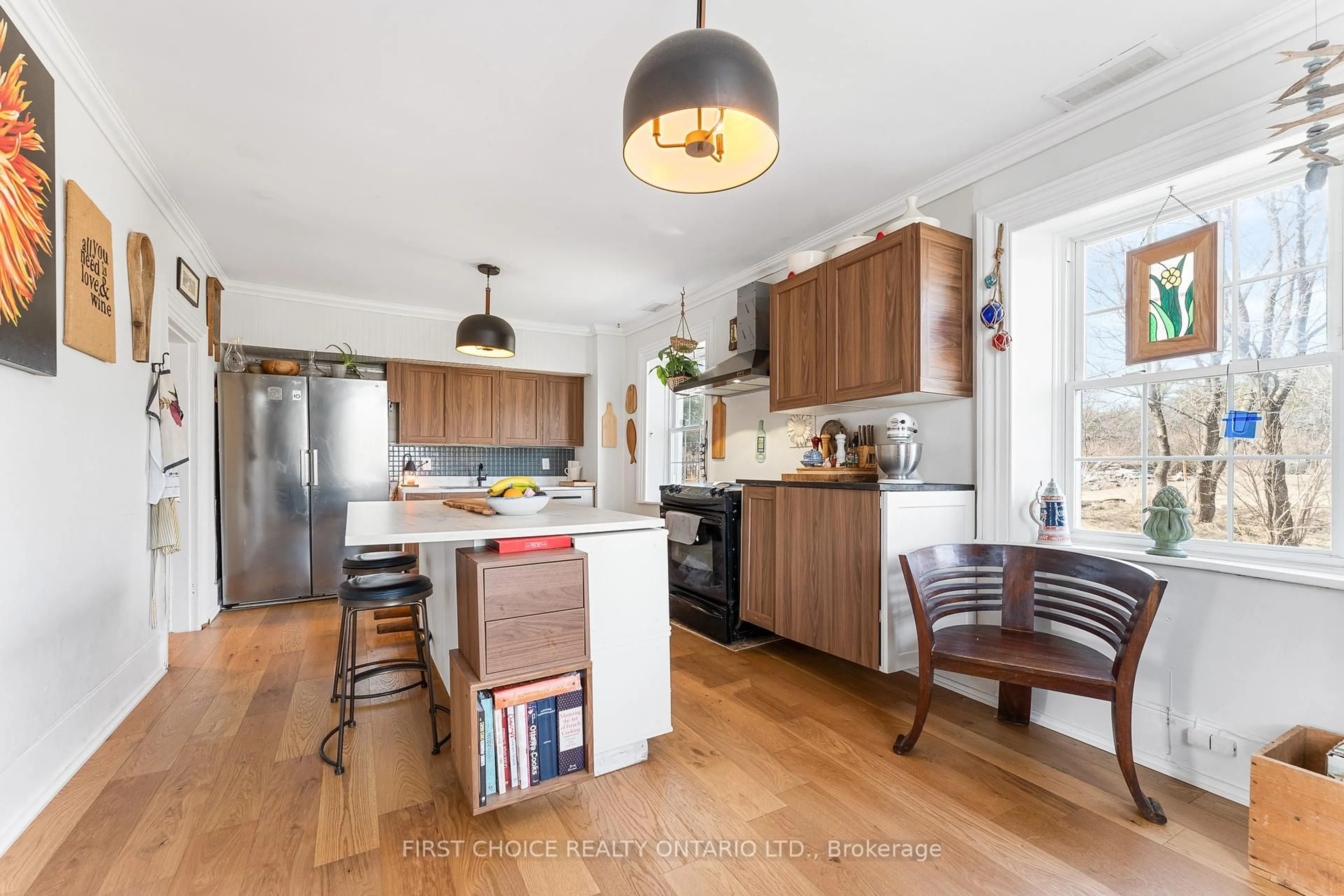 Open concept kitchen, wood/laminate floor for 8 Campbell Reid Crt, Ottawa Ontario K2K 1X7