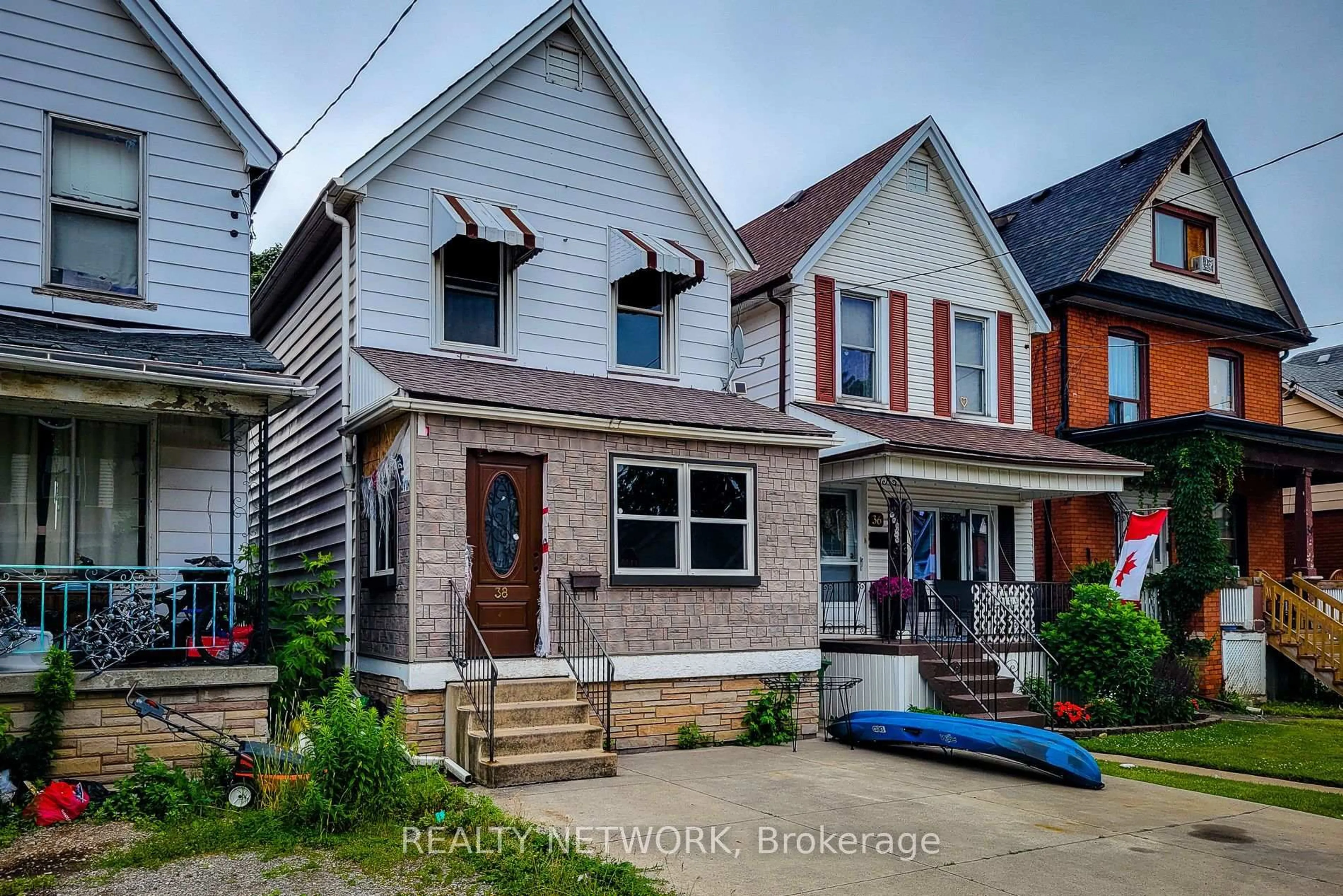 Home with brick exterior material, street for 38 Glendale Ave, Hamilton Ontario L8L 7J3