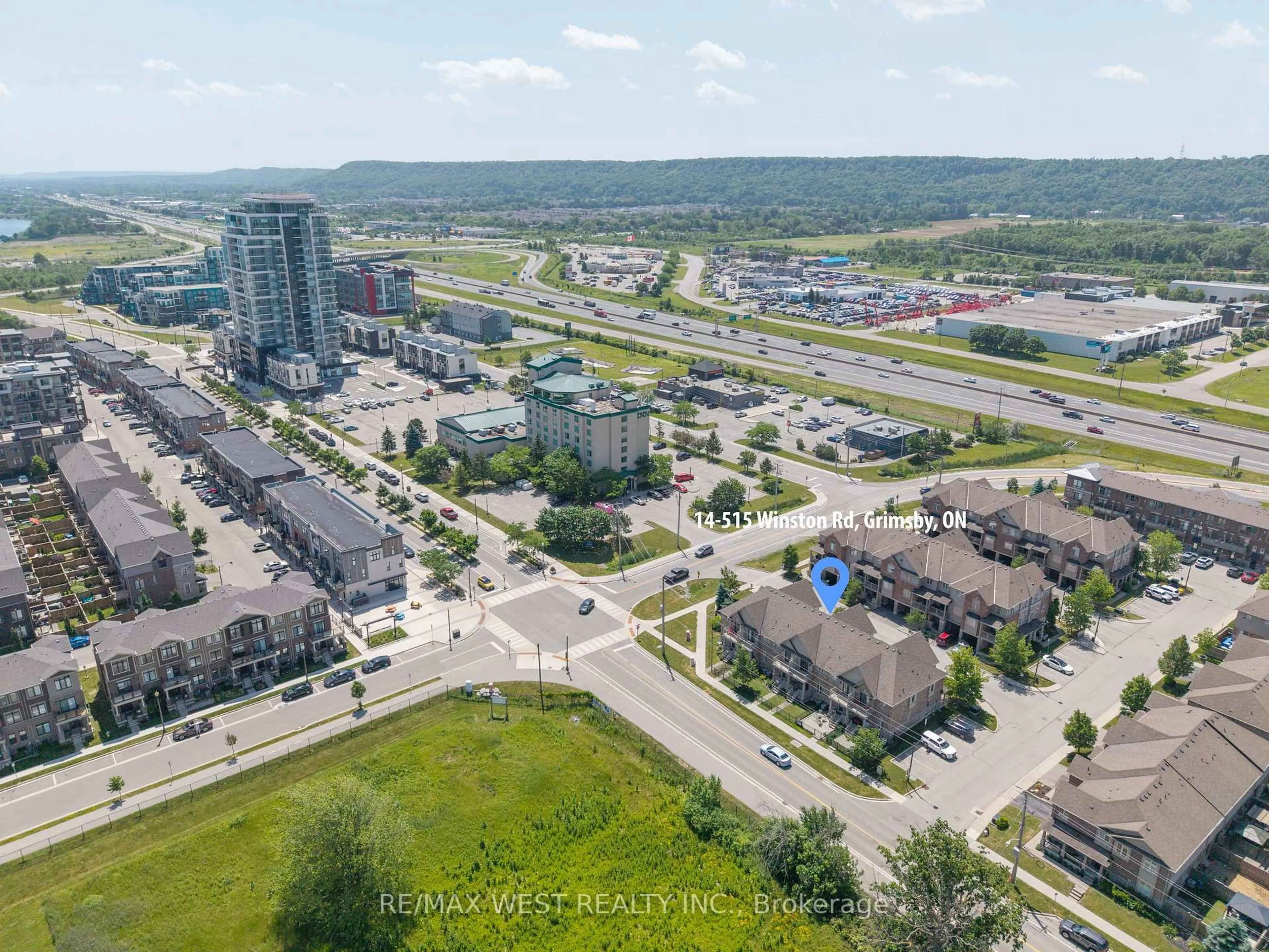 A pic from outside/outdoor area/front of a property/back of a property/a pic from drone, street for 515 Winston Rd #15, Grimsby Ontario L3M 0C8