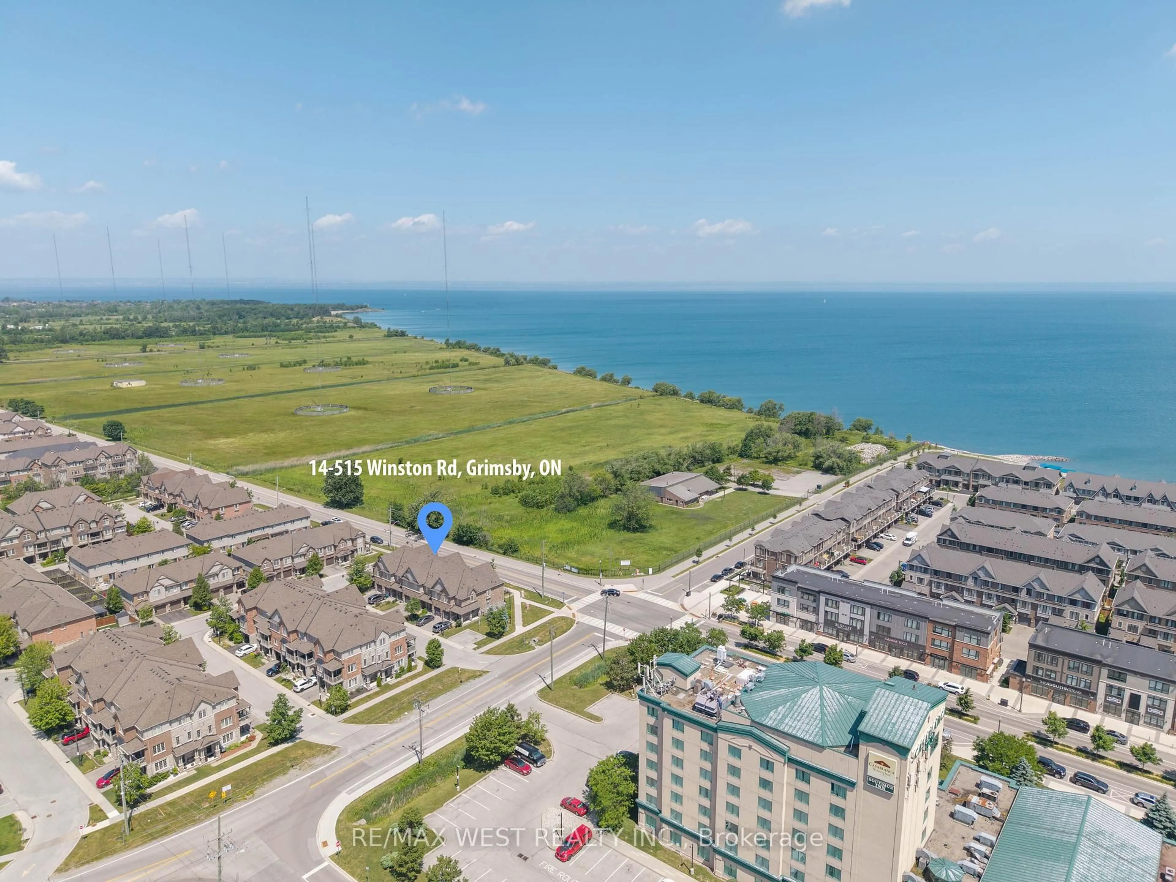 A pic from outside/outdoor area/front of a property/back of a property/a pic from drone, water/lake/river/ocean view for 515 Winston Rd #15, Grimsby Ontario L3M 0C8