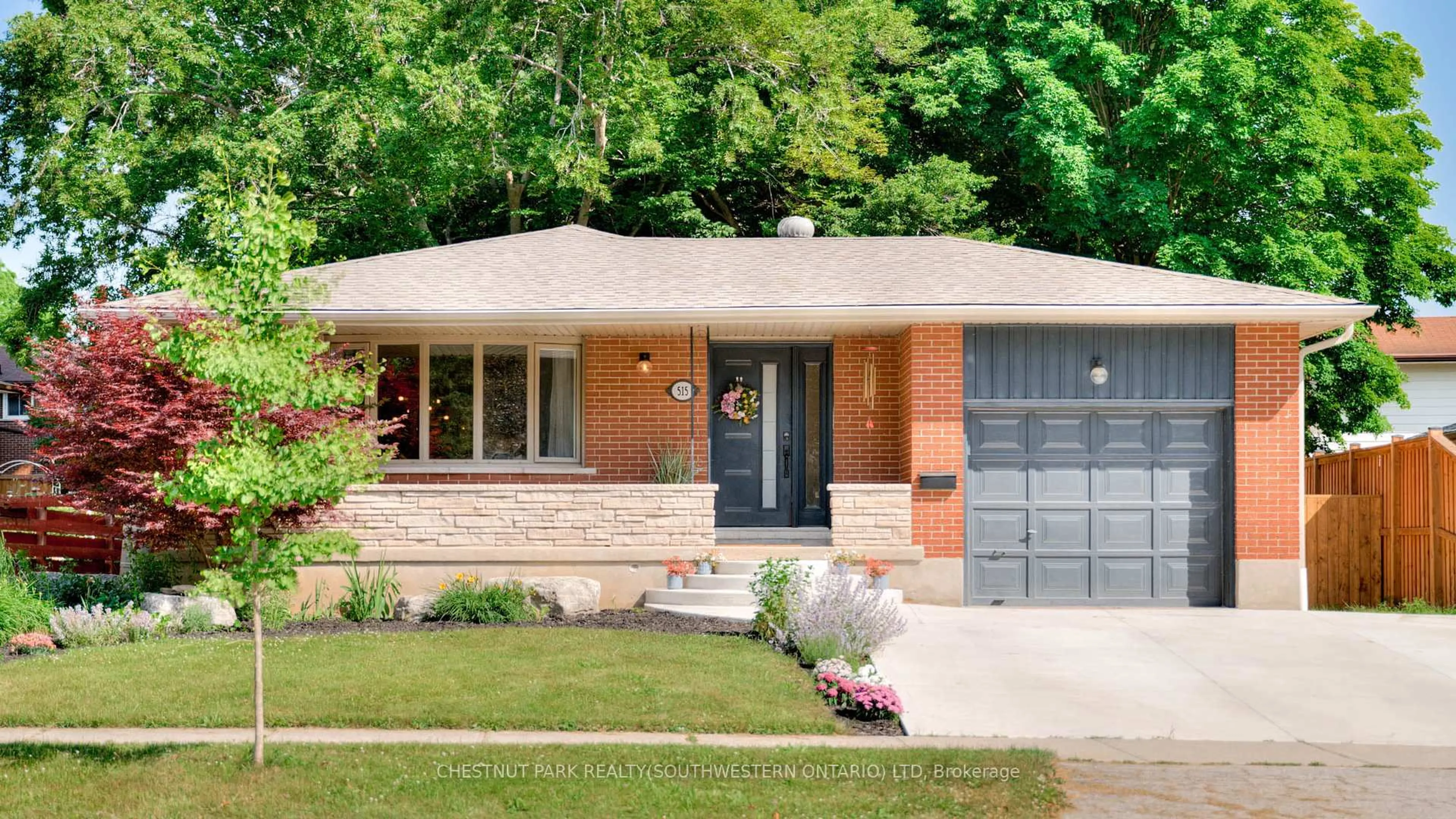 Home with brick exterior material, street for 515 Twin Oaks Cres, Waterloo Ontario N2L 4R9