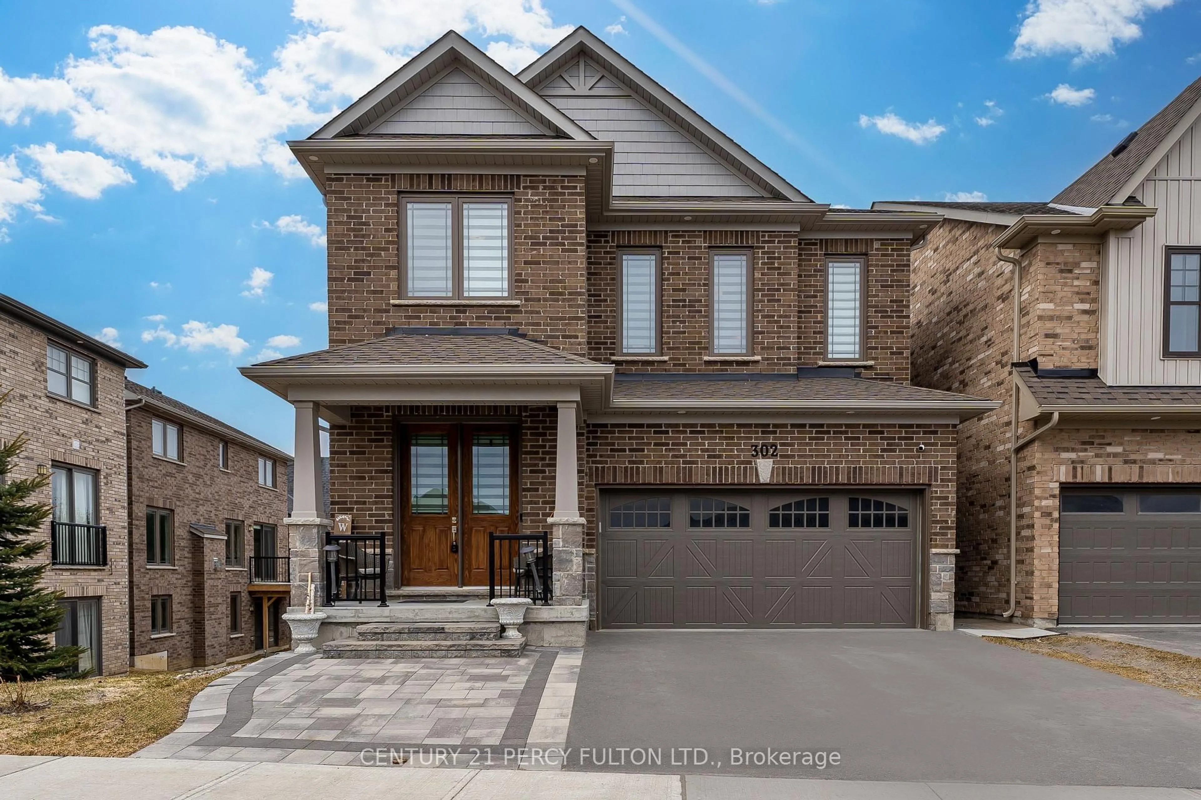Home with brick exterior material, street for 302 Cullen Tr, Peterborough North Ontario K9H 0J8