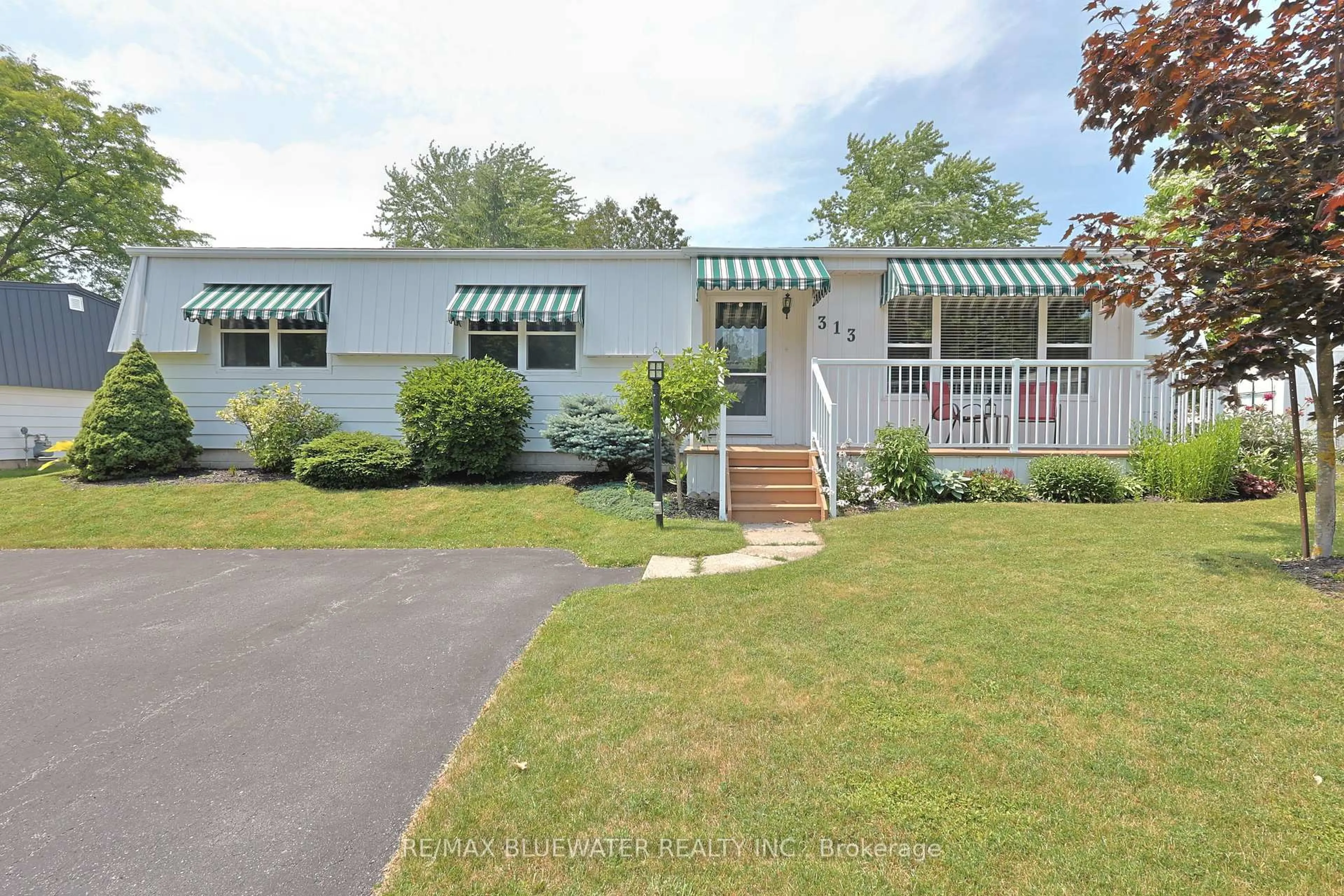 Home with vinyl exterior material, street for 313 Pinetree Lane, South Huron Ontario N0M 1T0