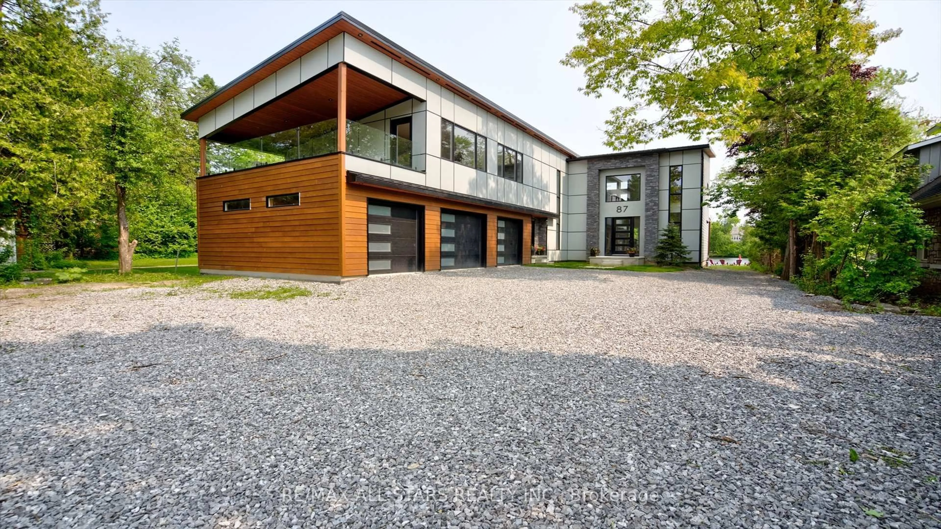 Home with brick exterior material, street for 87 Riverside Dr, Kawartha Lakes Ontario K0M 1A0