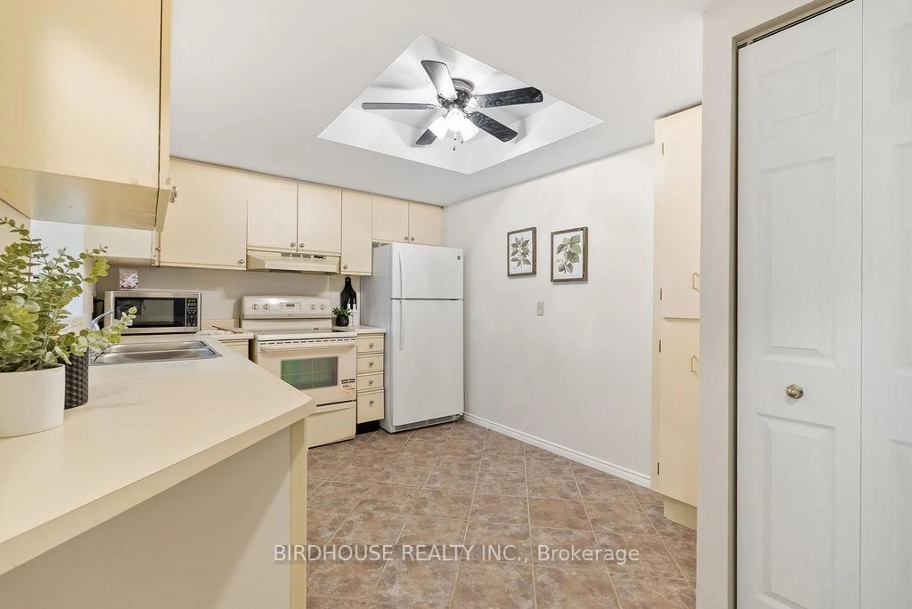 Standard kitchen, ceramic/tile floor for 2 Heritage Way #202, Kawartha Lakes Ontario K9V 5P5