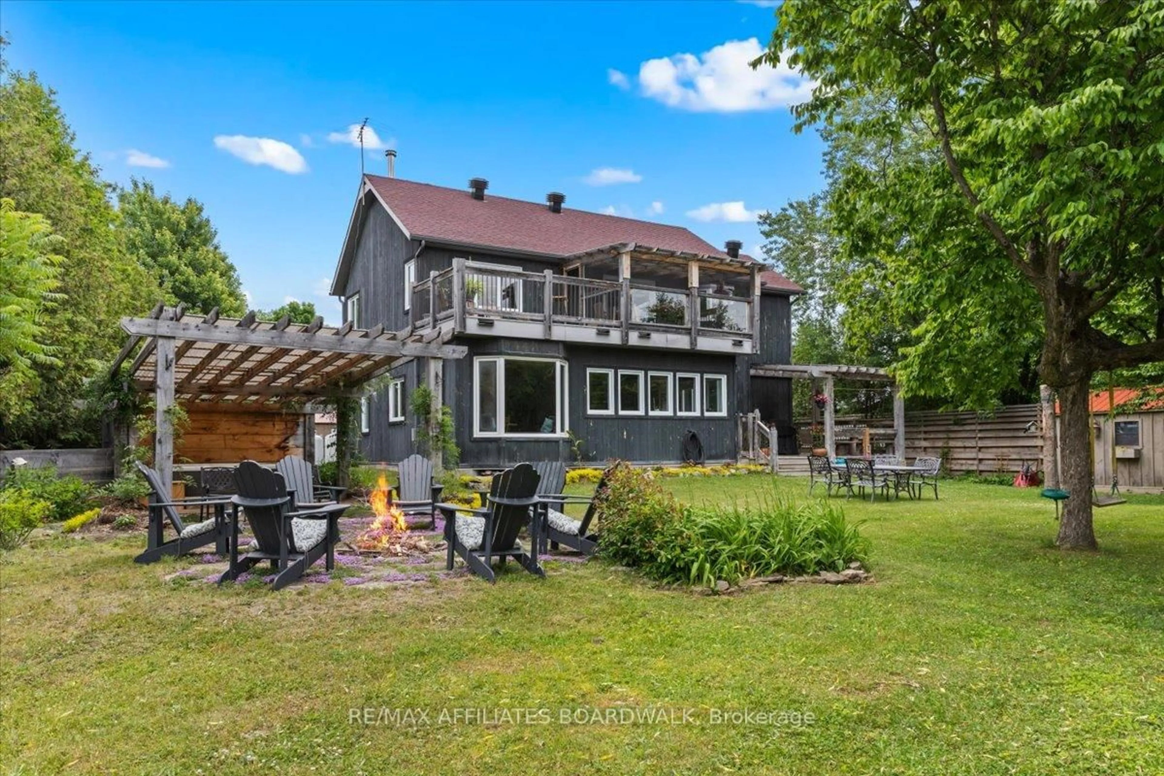 A pic from outside/outdoor area/front of a property/back of a property/a pic from drone, water/lake/river/ocean view for 115 Patty Lane, Carleton Place Ontario K7C 3P1