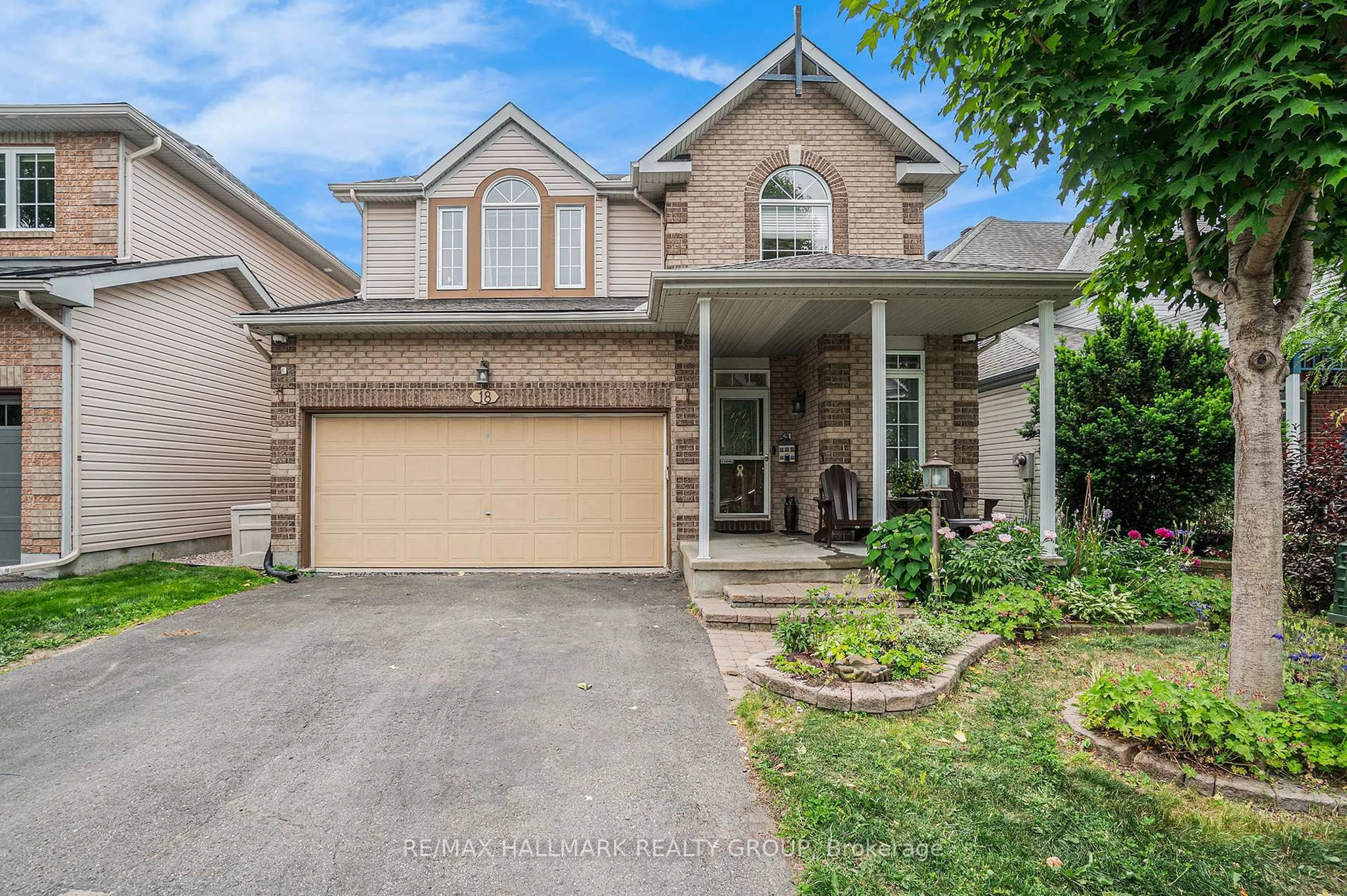 Home with brick exterior material, street for 18 Golder's Green Lane, Ottawa Ontario K2J 5C1