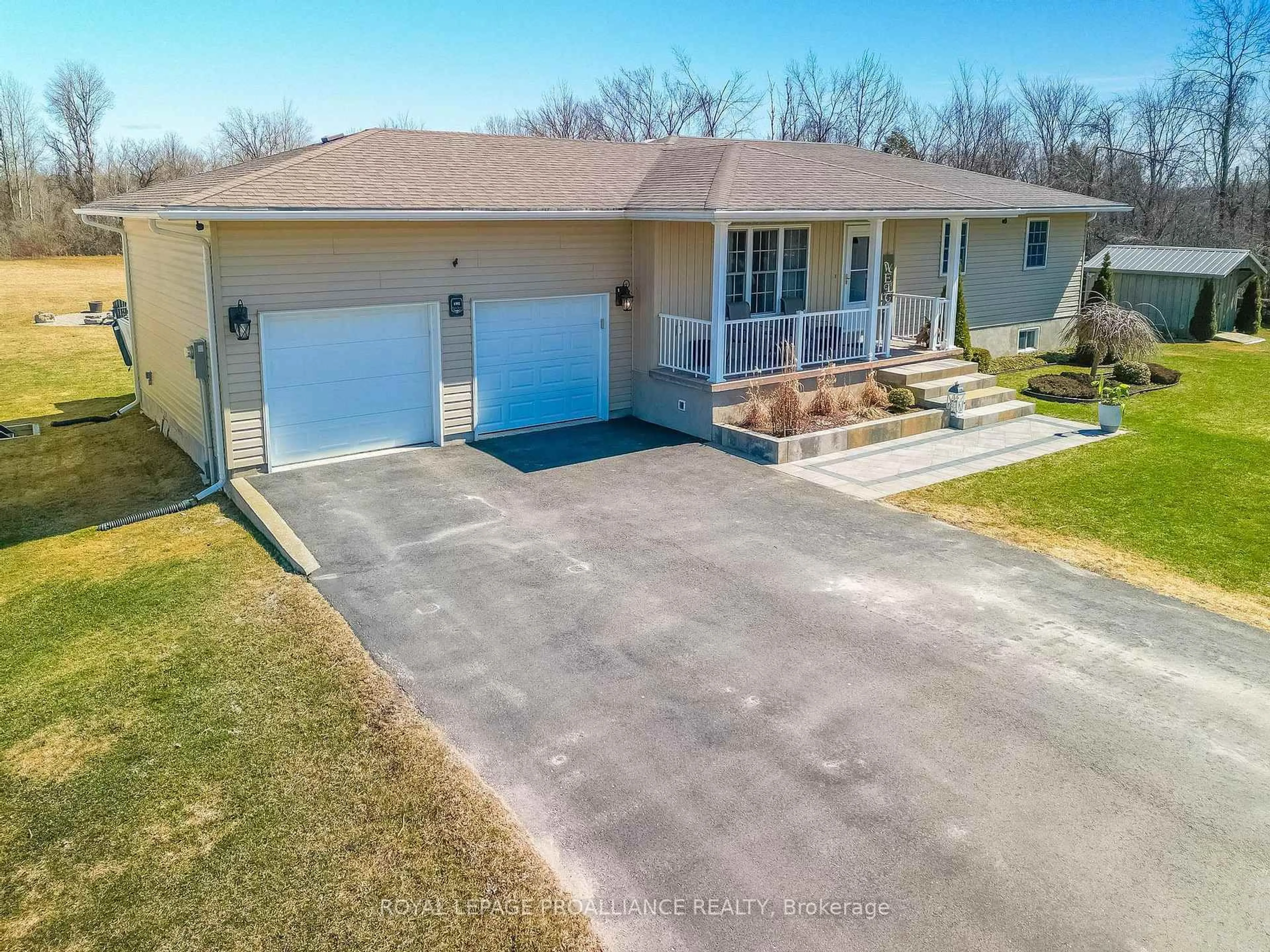 A pic from outside/outdoor area/front of a property/back of a property/a pic from drone, water/lake/river/ocean view for 1302 Rapids Rd, Tweed Ontario K0K 3J0
