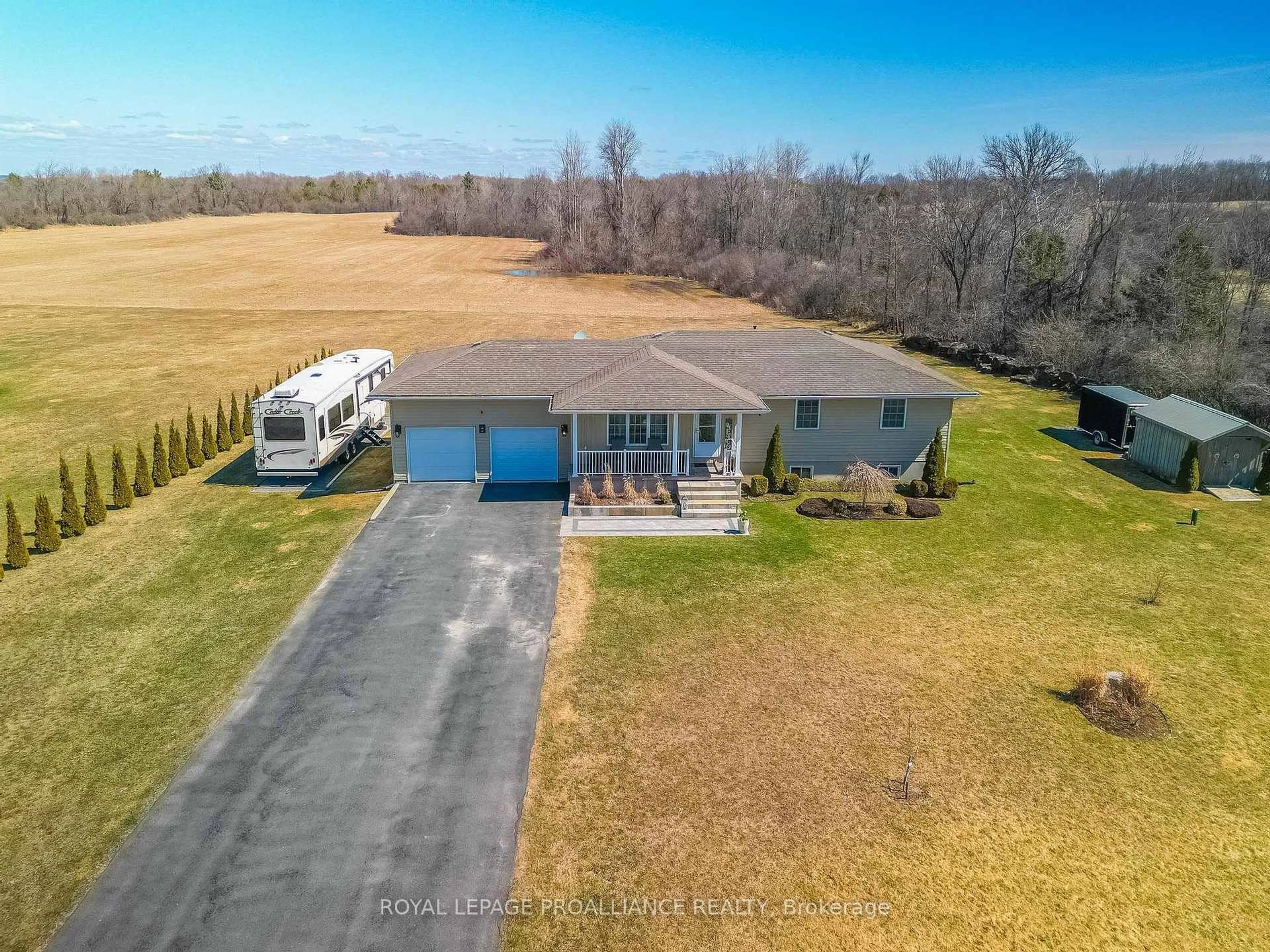 A pic from outside/outdoor area/front of a property/back of a property/a pic from drone, water/lake/river/ocean view for 1302 Rapids Rd, Tweed Ontario K0K 3J0