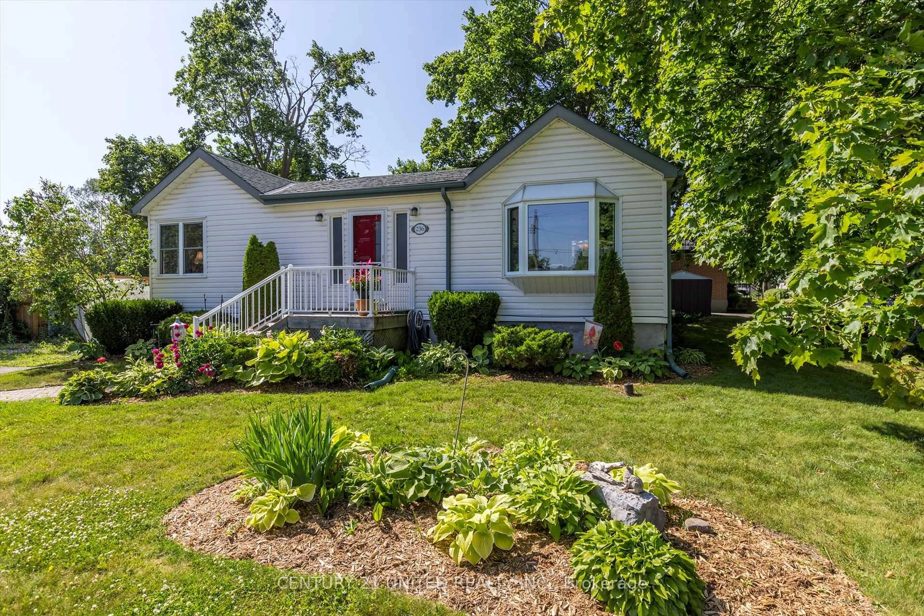 Home with vinyl exterior material, street for 236 Lee St, Peterborough North Ontario K9H 5P1