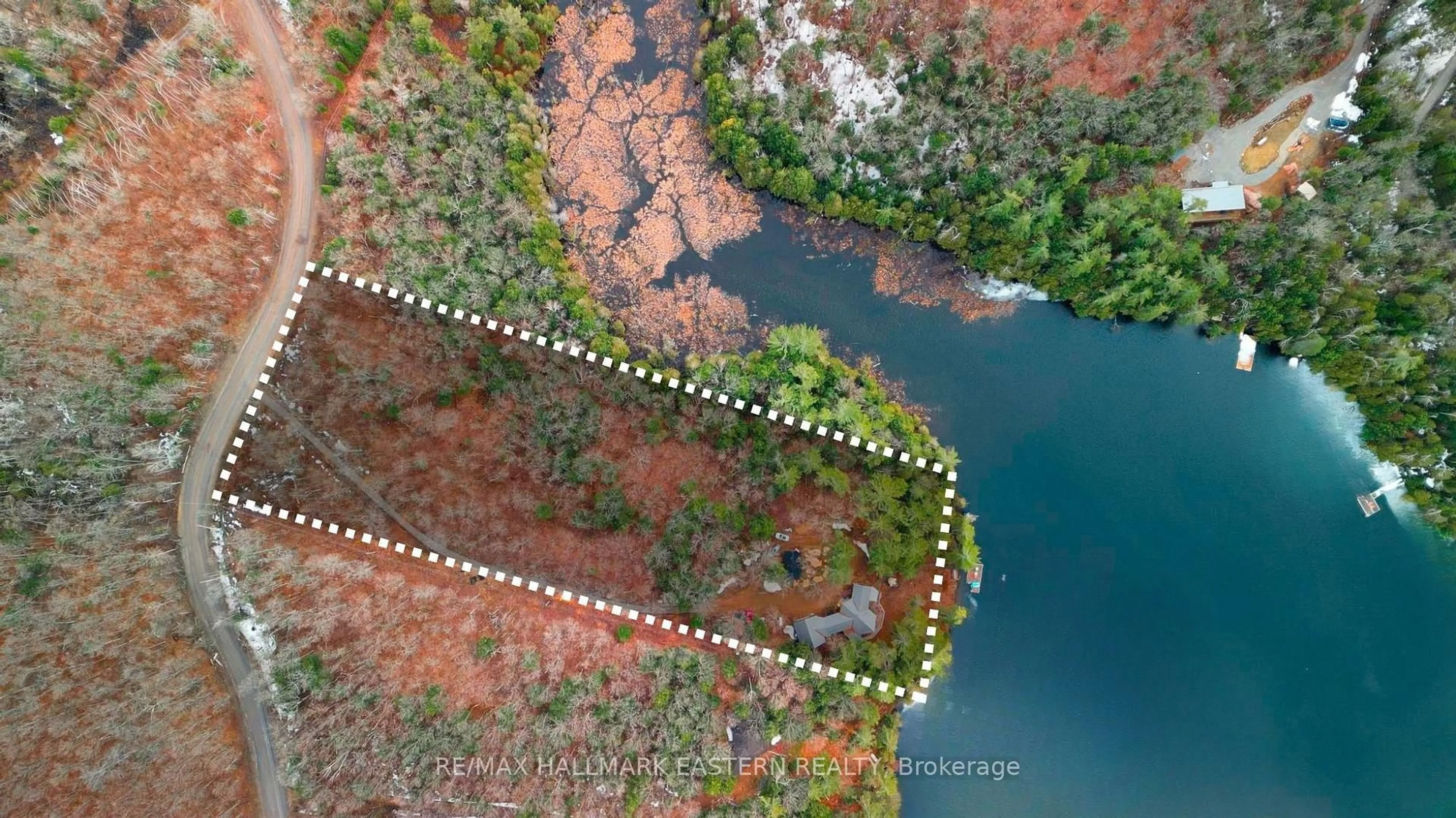 A pic from outside/outdoor area/front of a property/back of a property/a pic from drone, water/lake/river/ocean view for 69 Alexander Crt, Trent Lakes Ontario K0L 1J0