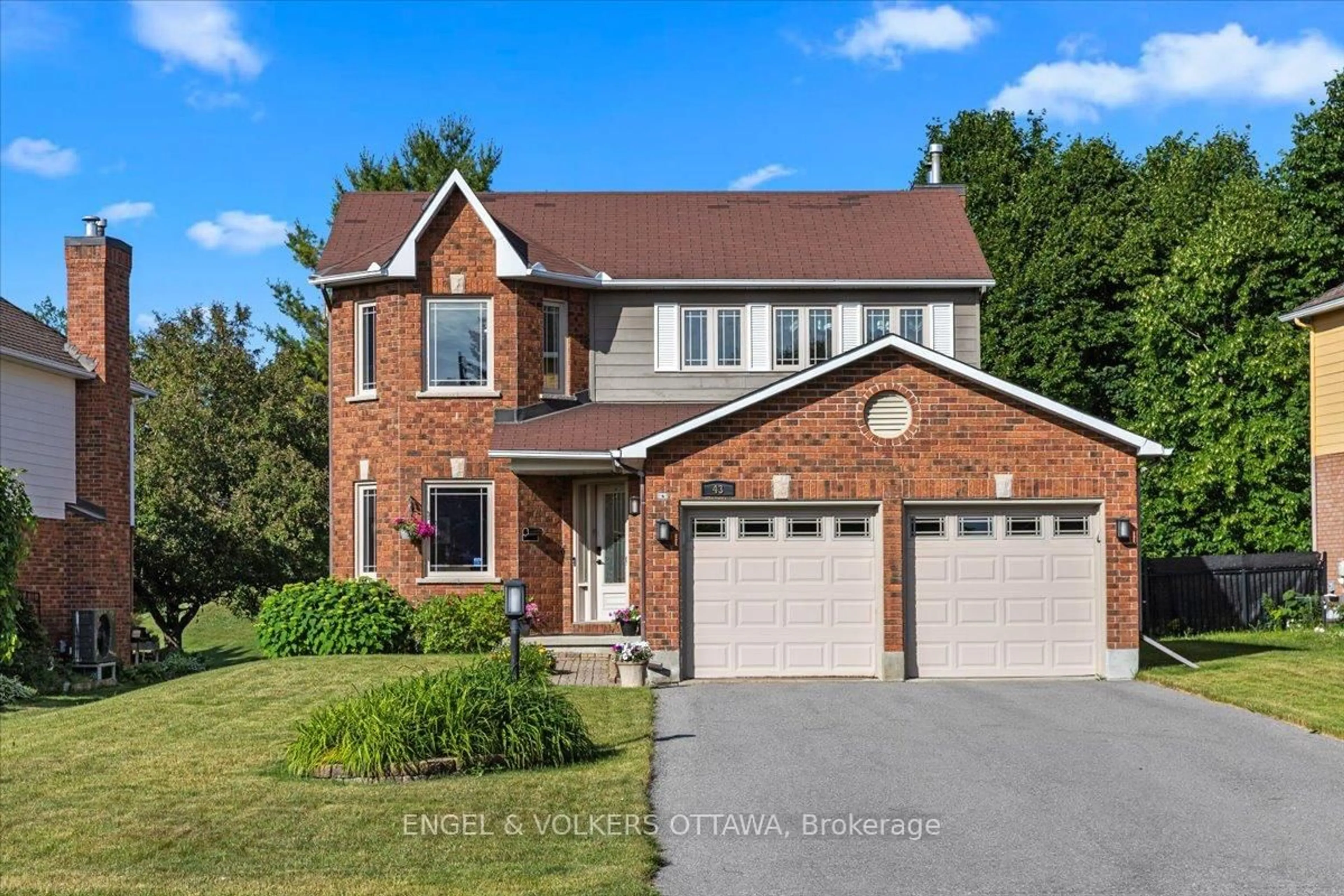 Home with brick exterior material, street for 43 Weslock Way, Ottawa Ontario K2K 2K5