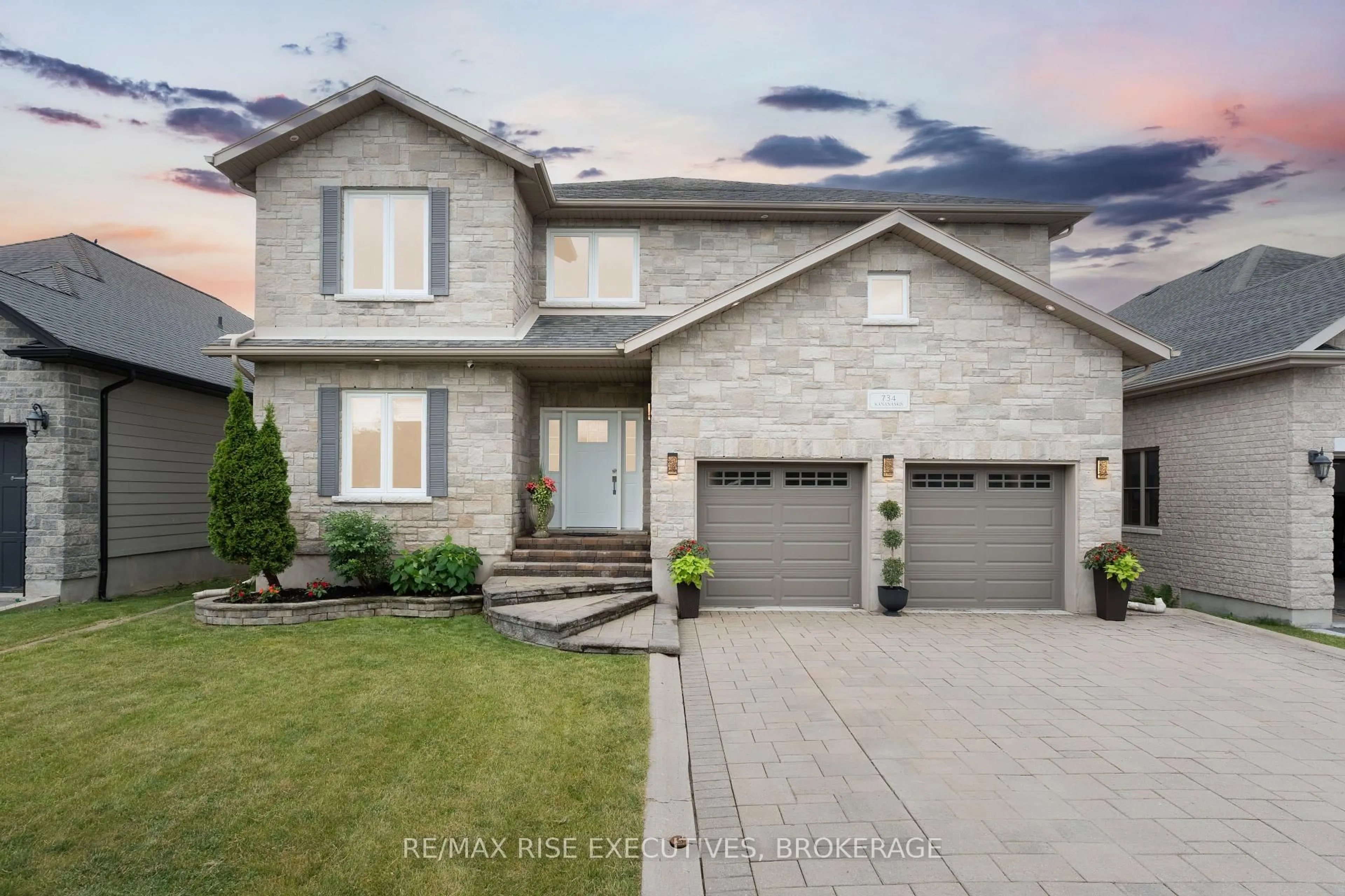 Home with brick exterior material, street for 734 Kananaskis Dr, Kingston Ontario K7P 0A9