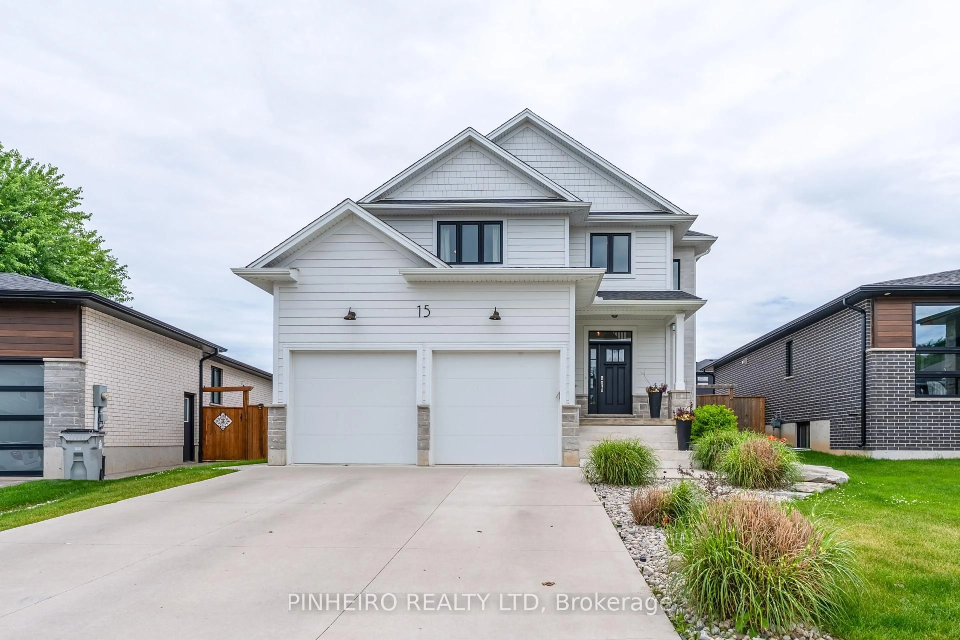 Home with vinyl exterior material, street for 15 Kemp Cres, Strathroy-Caradoc Ontario N7G 0G3