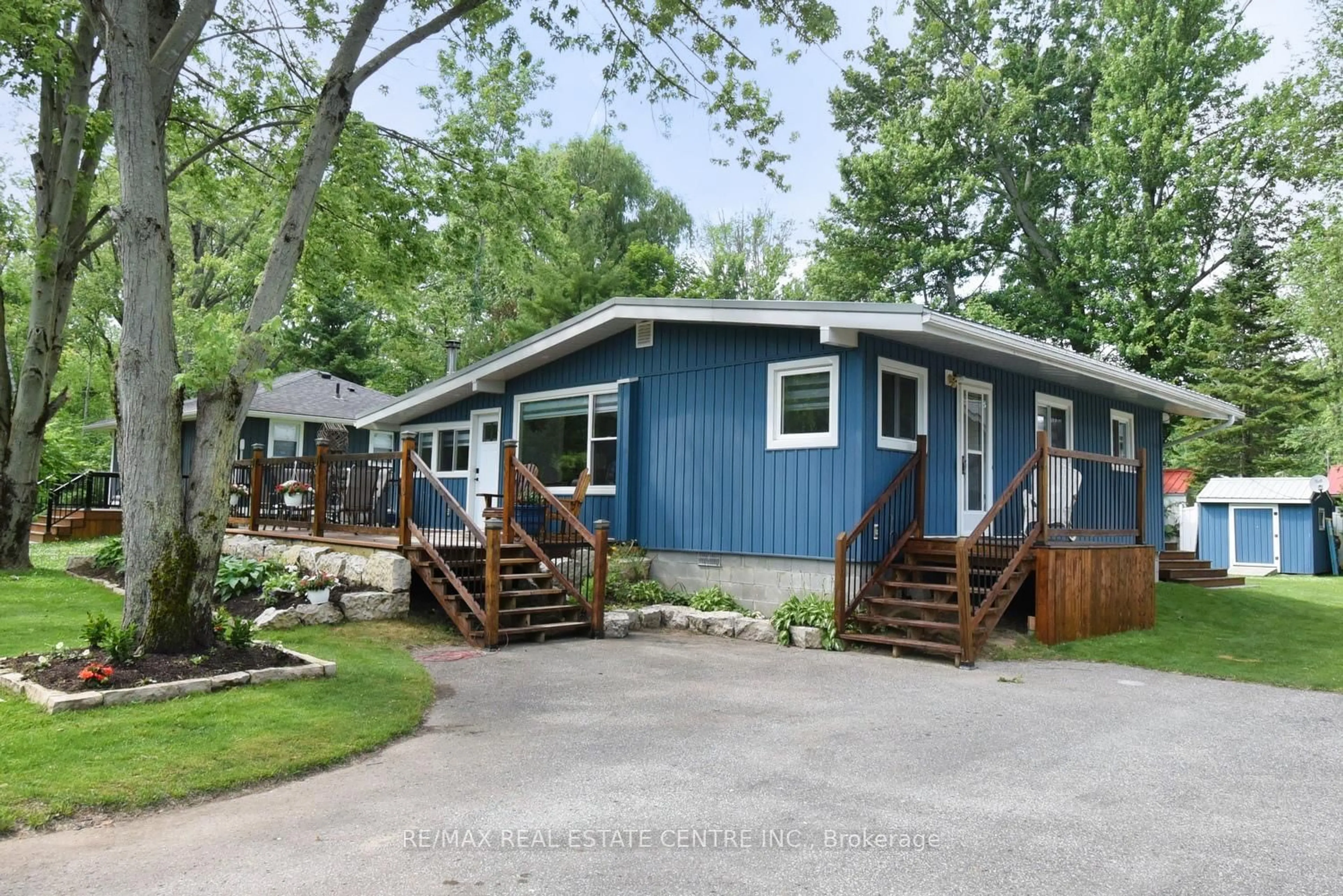 Home with vinyl exterior material, street for 5 Ralph St, Norfolk Ontario N0E 1T0