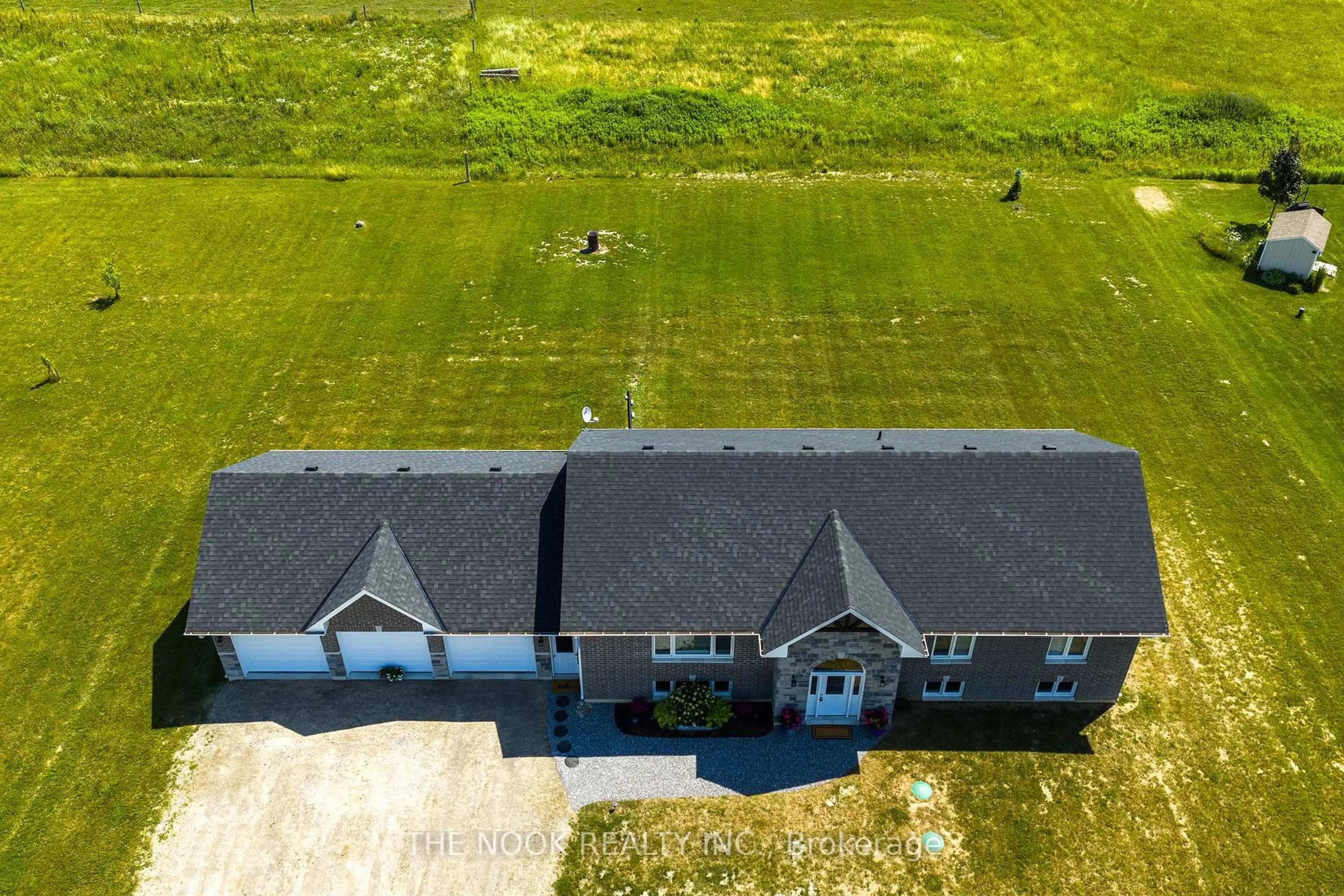 A pic from outside/outdoor area/front of a property/back of a property/a pic from drone, building for 174 VALENTIA Rd, Kawartha Lakes Ontario K0M 2C0