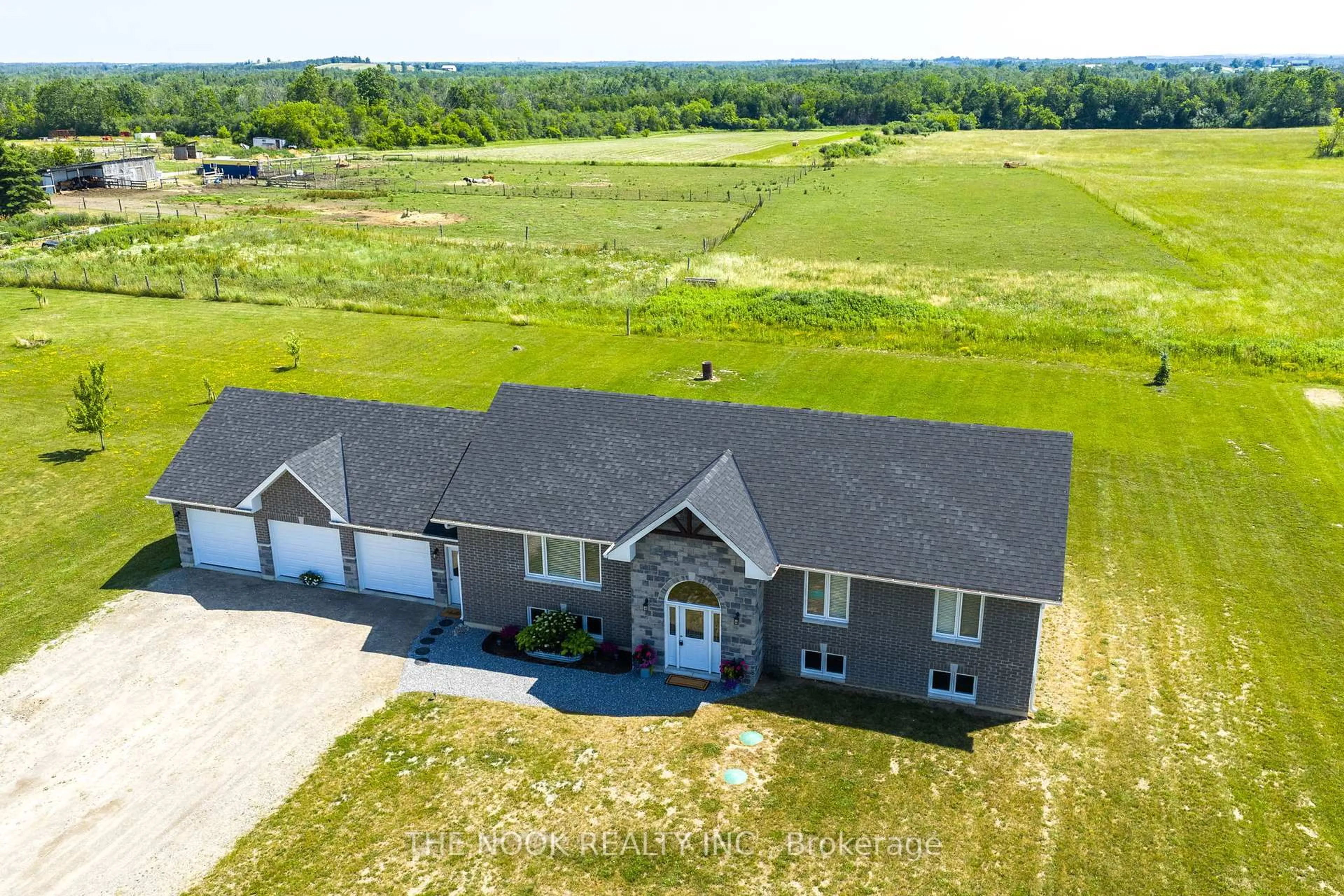 A pic from outside/outdoor area/front of a property/back of a property/a pic from drone, building for 174 VALENTIA Rd, Kawartha Lakes Ontario K0M 2C0