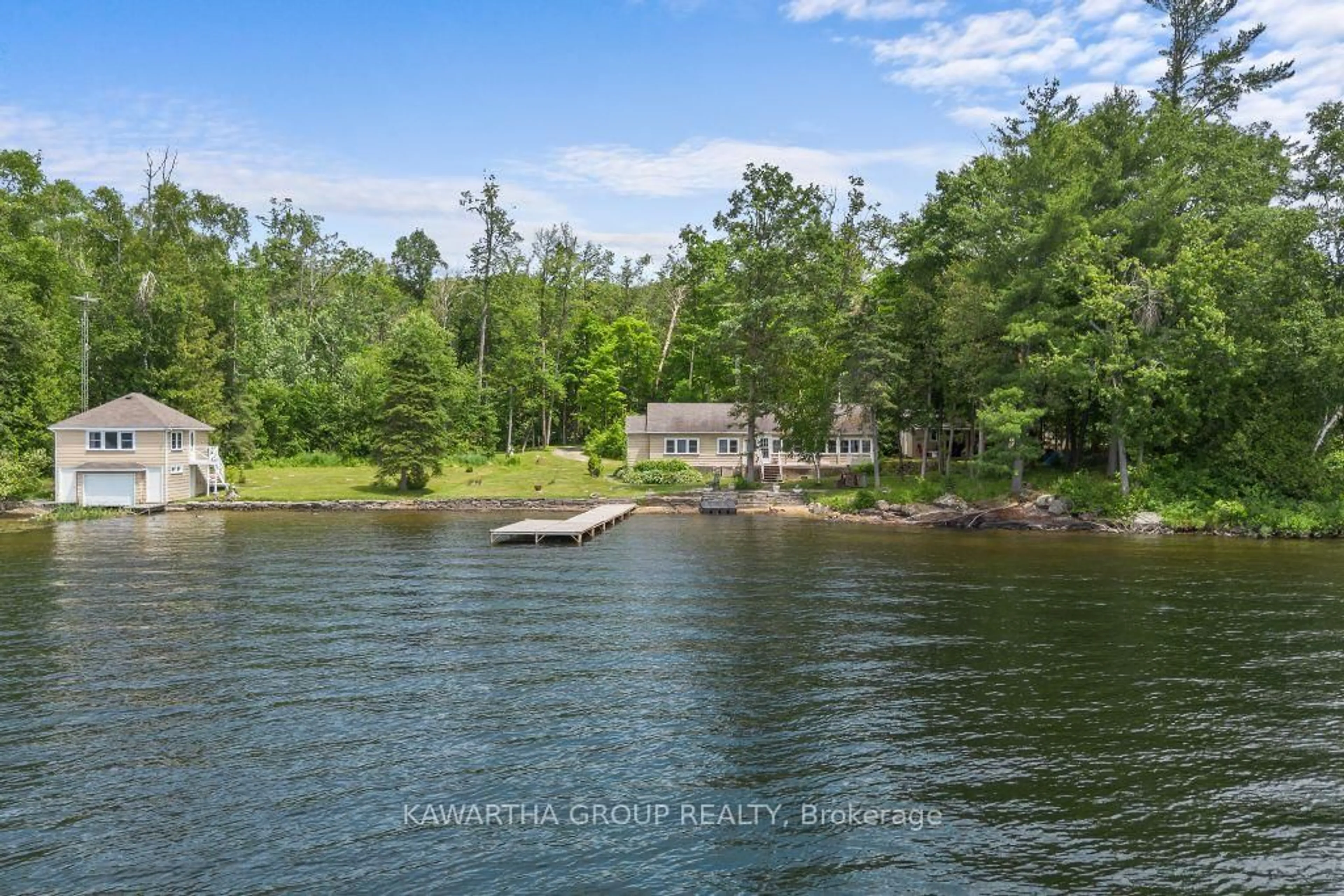A pic from outside/outdoor area/front of a property/back of a property/a pic from drone, water/lake/river/ocean view for 103 Shadow Lake 6 Rd, Kawartha Lakes Ontario K0M 1K0