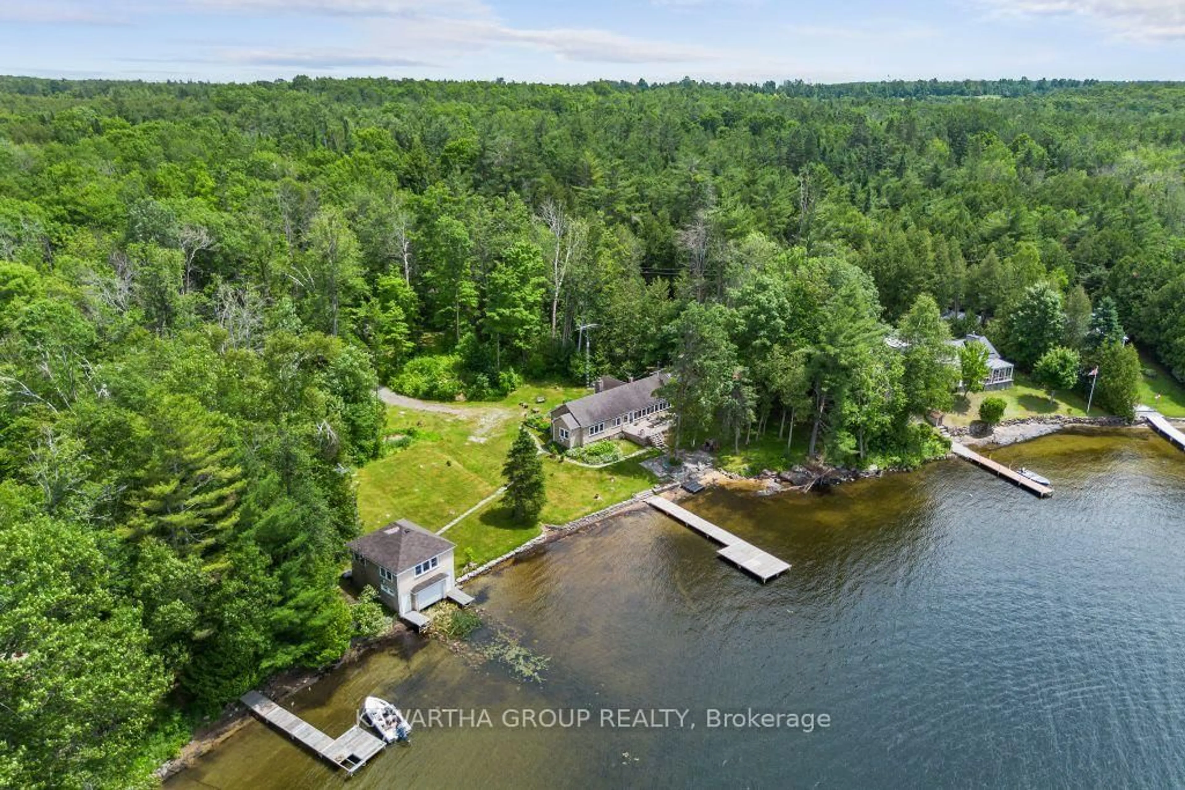 A pic from outside/outdoor area/front of a property/back of a property/a pic from drone, water/lake/river/ocean view for 103 Shadow Lake 6 Rd, Kawartha Lakes Ontario K0M 1K0