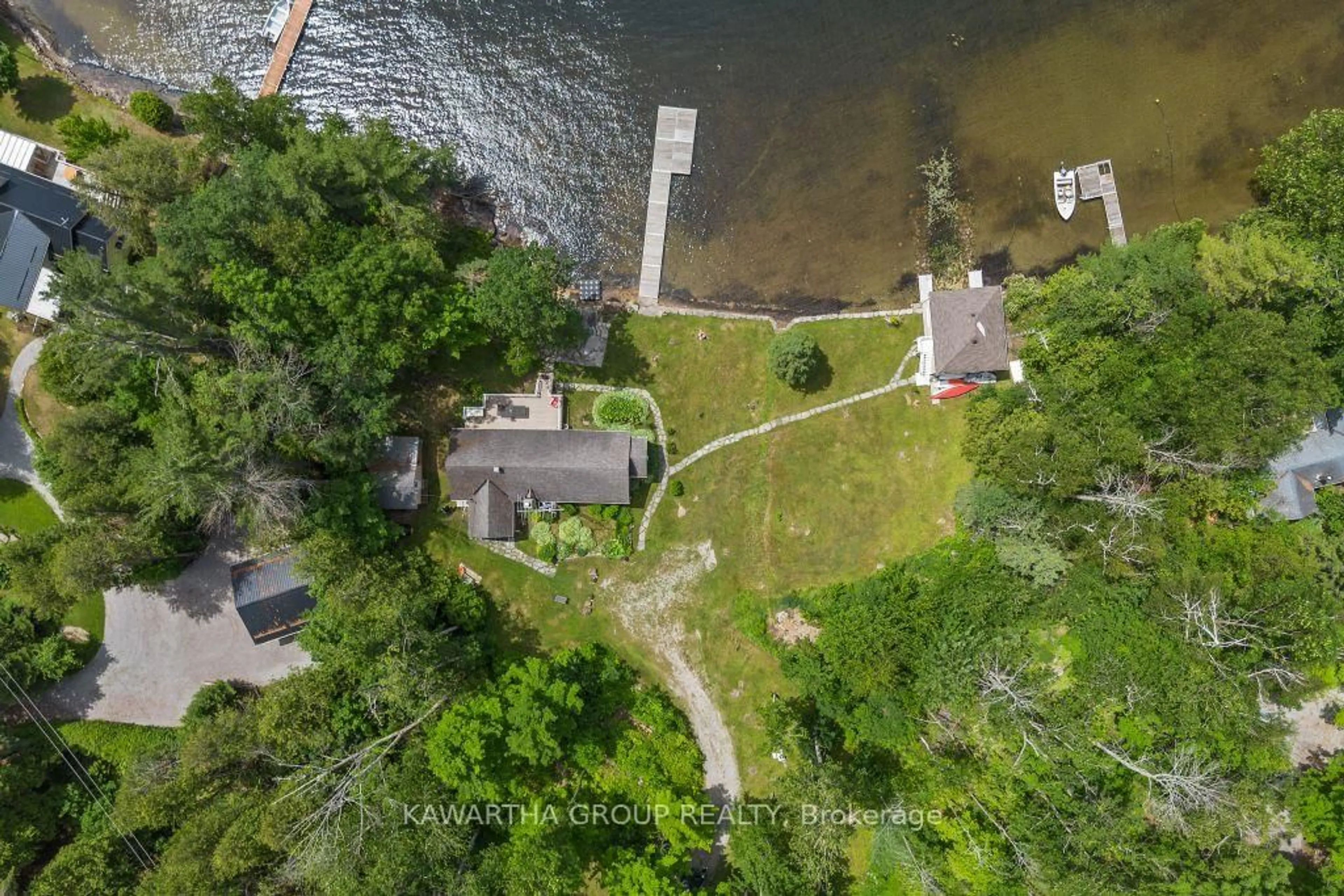 A pic from outside/outdoor area/front of a property/back of a property/a pic from drone, water/lake/river/ocean view for 103 Shadow Lake 6 Rd, Kawartha Lakes Ontario K0M 1K0