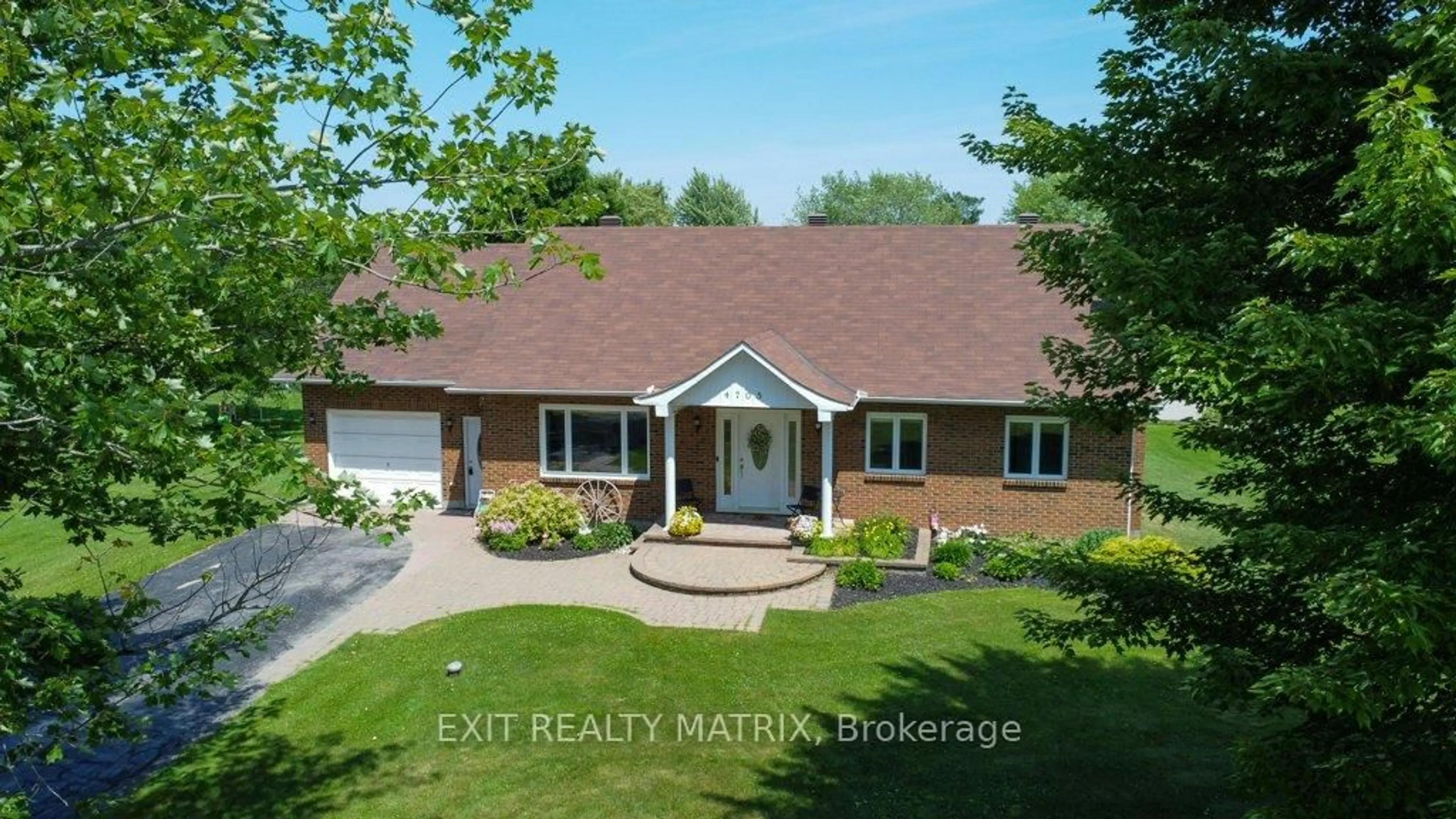 A pic from outside/outdoor area/front of a property/back of a property/a pic from drone, street for 4705 McNeely Rd, Navan Ontario K4B 1J1