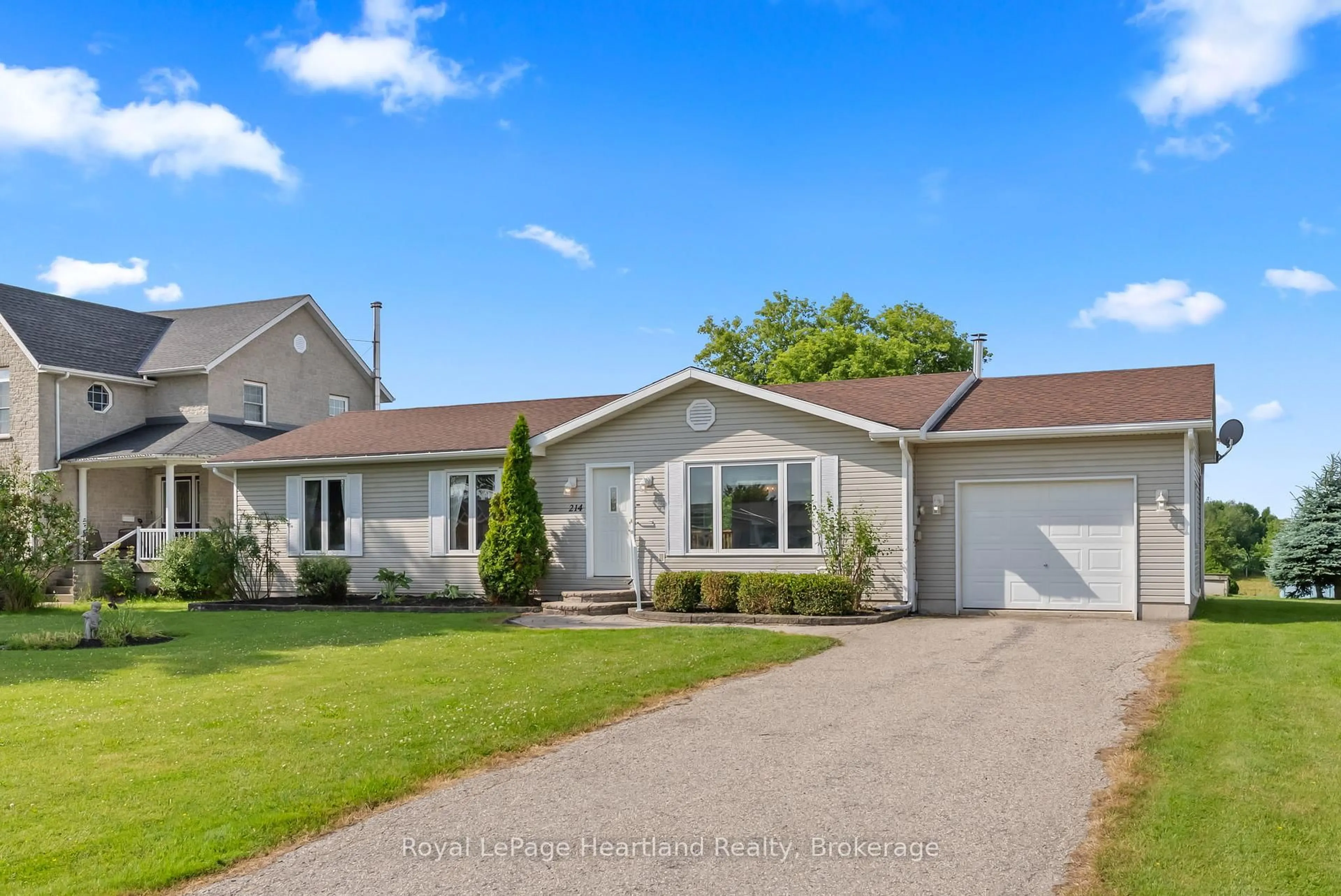 Home with vinyl exterior material, street for 214 Margaret St, Minto Ontario N0G 1Z0