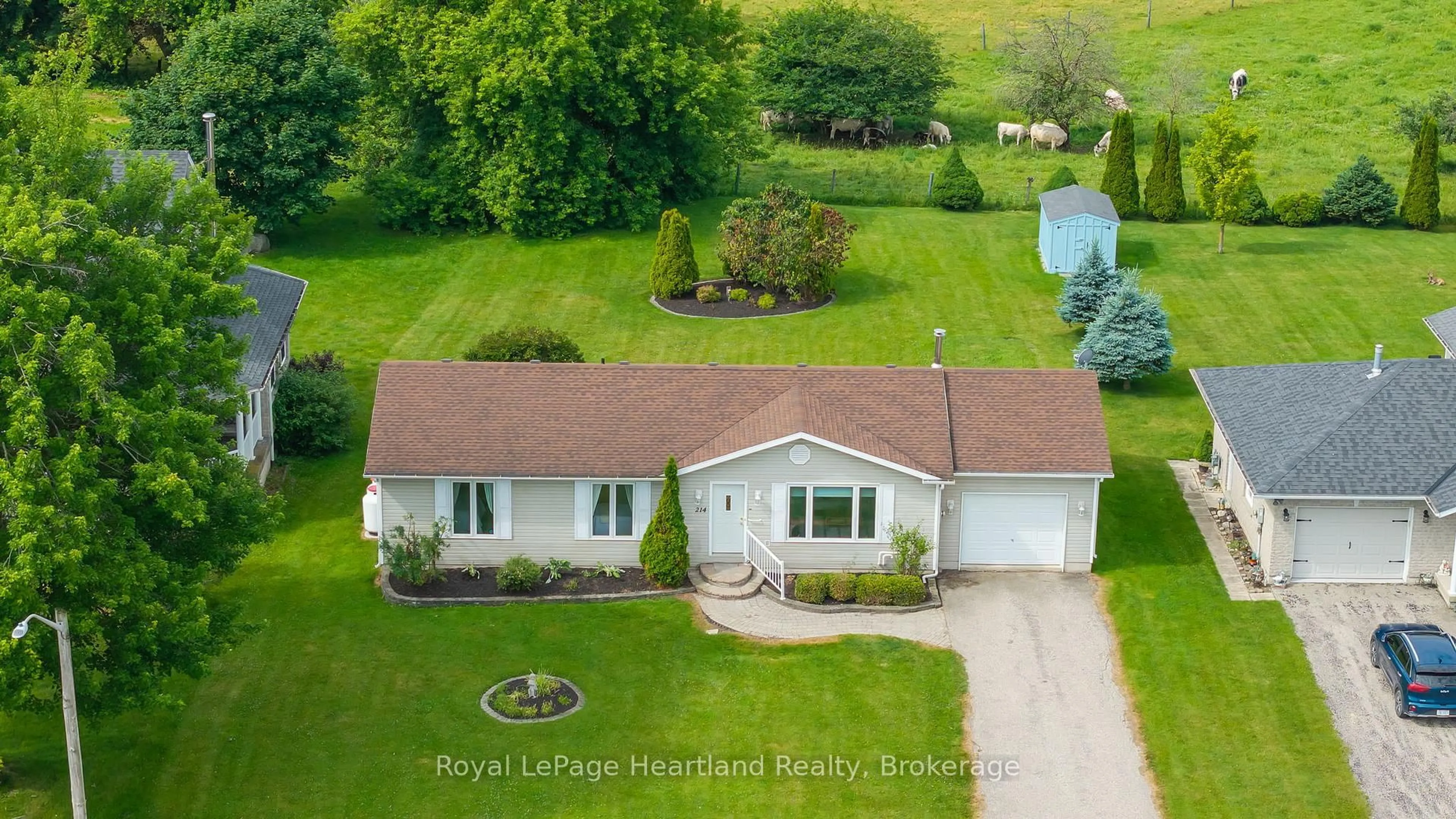 A pic from outside/outdoor area/front of a property/back of a property/a pic from drone, water/lake/river/ocean view for 214 Margaret St, Minto Ontario N0G 1Z0