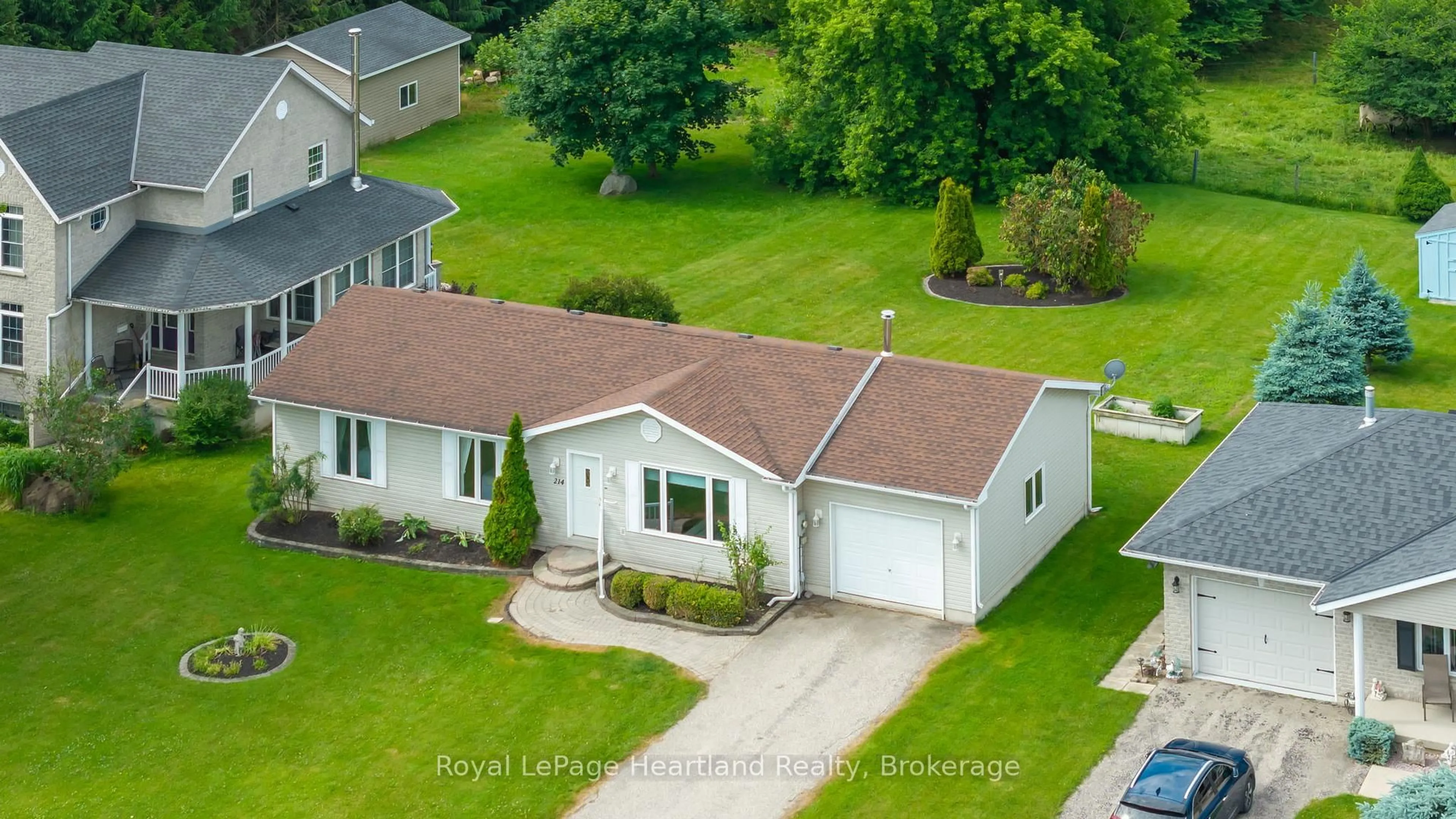 A pic from outside/outdoor area/front of a property/back of a property/a pic from drone, unknown for 214 Margaret St, Minto Ontario N0G 1Z0